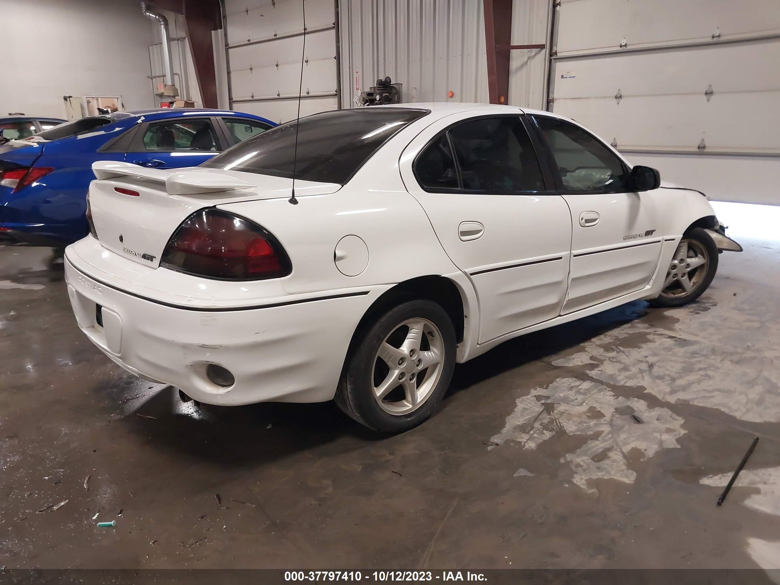 Photo 3 VIN: 1G2NW52E4YM706083 - PONTIAC GRAND AM 