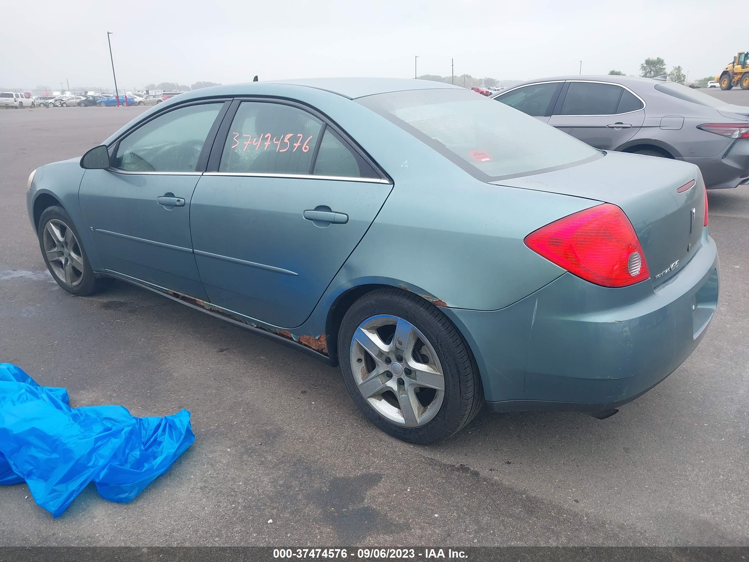 Photo 2 VIN: 1G2ZG57BX94110975 - PONTIAC G6 