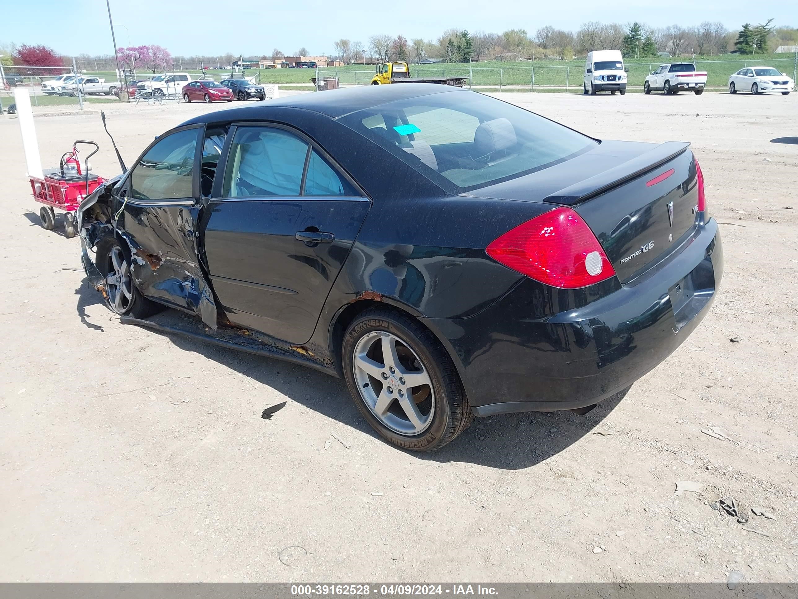 Photo 2 VIN: 1G2ZG58N474115787 - PONTIAC G6 