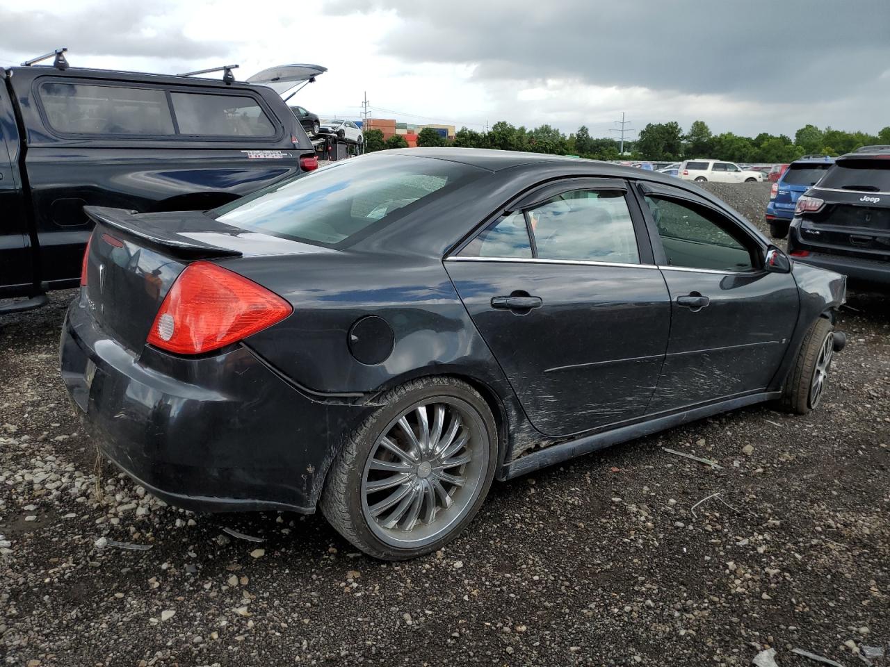 Photo 2 VIN: 1G2ZJ57B094275371 - PONTIAC G6 