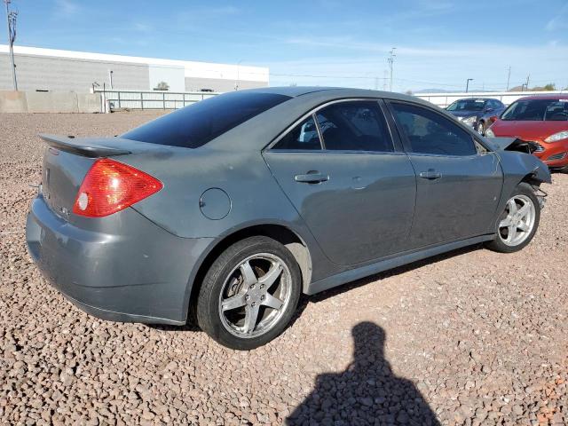 Photo 2 VIN: 1G2ZJ57KX94238697 - PONTIAC G6 