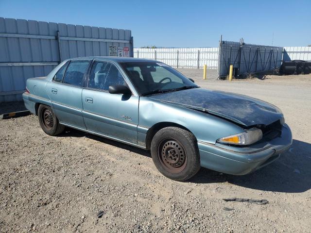 Photo 3 VIN: 1G4NJ52M6TC420022 - BUICK SKYLARK GR 