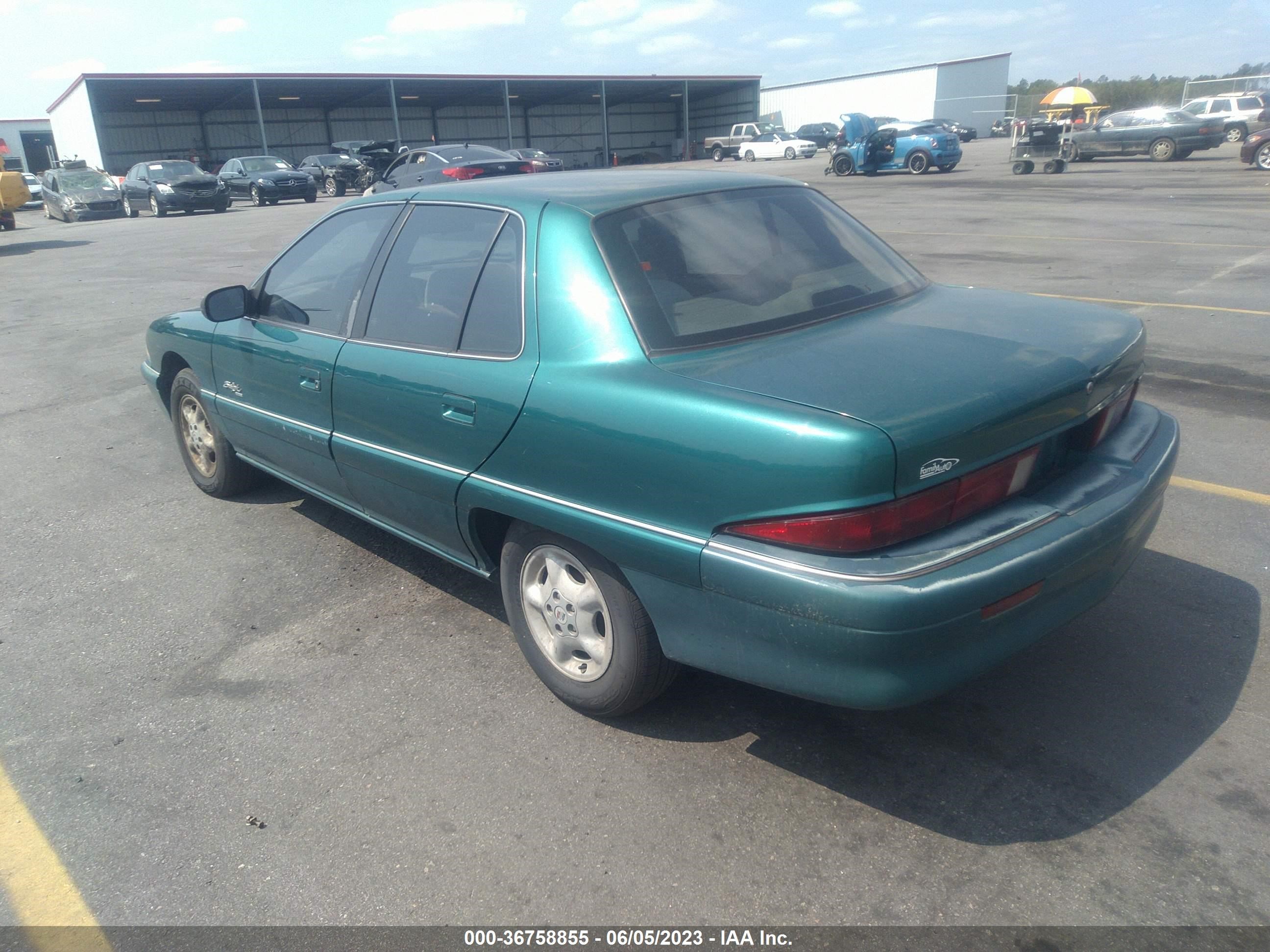 Photo 2 VIN: 1G4NJ52M6VC407712 - BUICK SKYLARK 