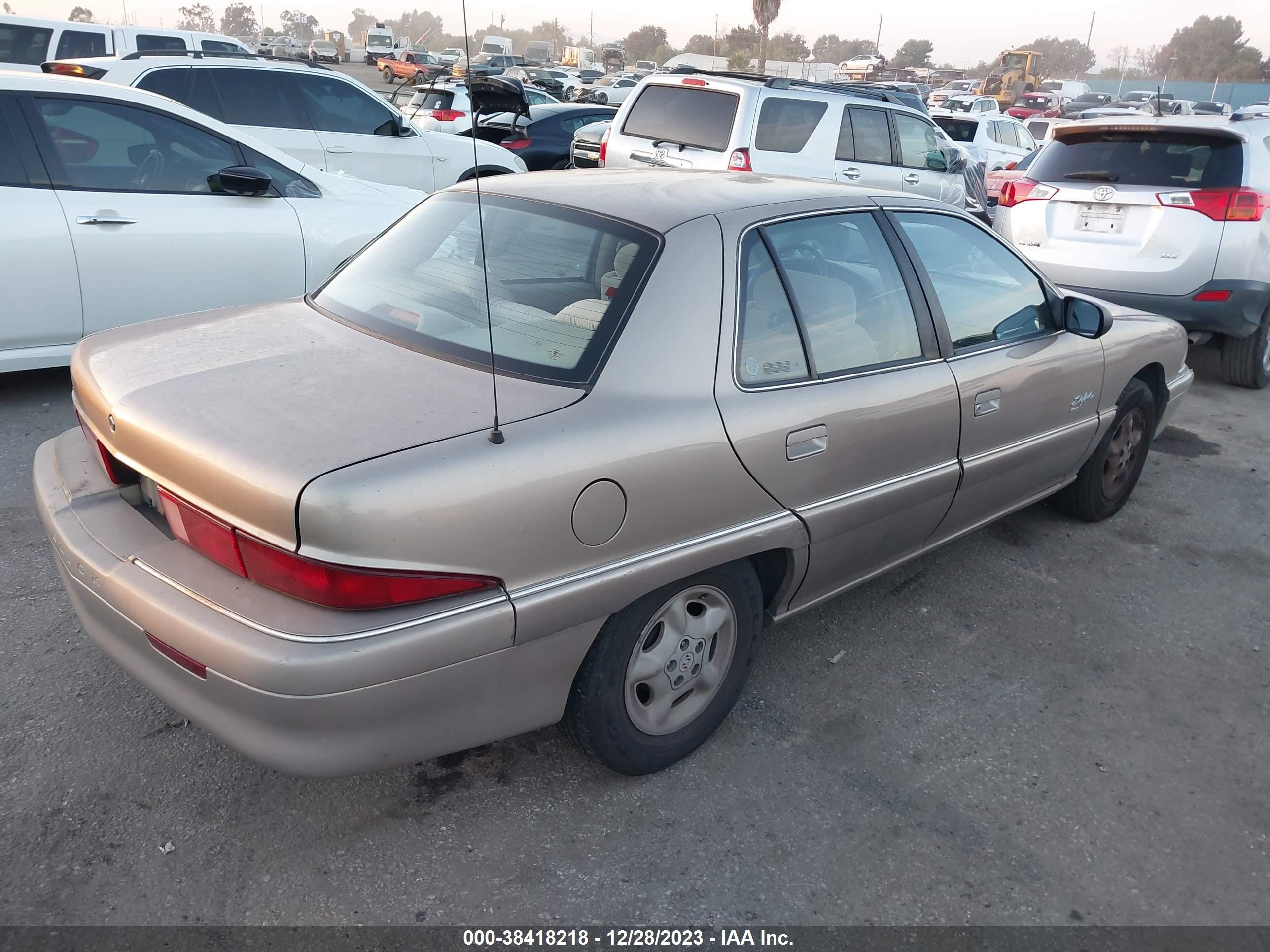 Photo 3 VIN: 1G4NJ52T4VC451053 - BUICK SKYLARK 