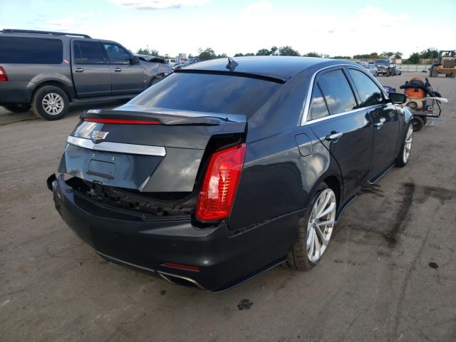 Photo 3 VIN: 1G6AR5S35E0131627 - CADILLAC CTS LUXURY 