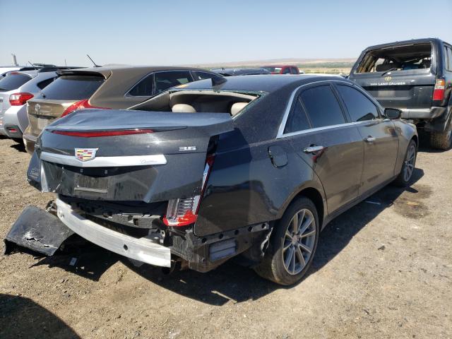 Photo 3 VIN: 1G6AX5SS4J0184035 - CADILLAC CTS LUXURY 