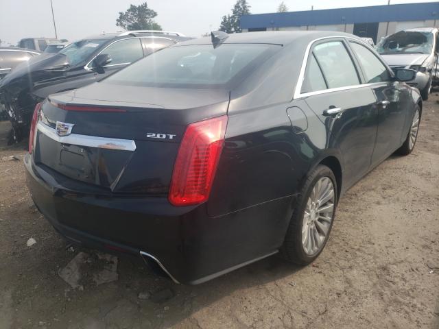 Photo 3 VIN: 1G6AX5SX5J0123000 - CADILLAC CTS LUXURY 