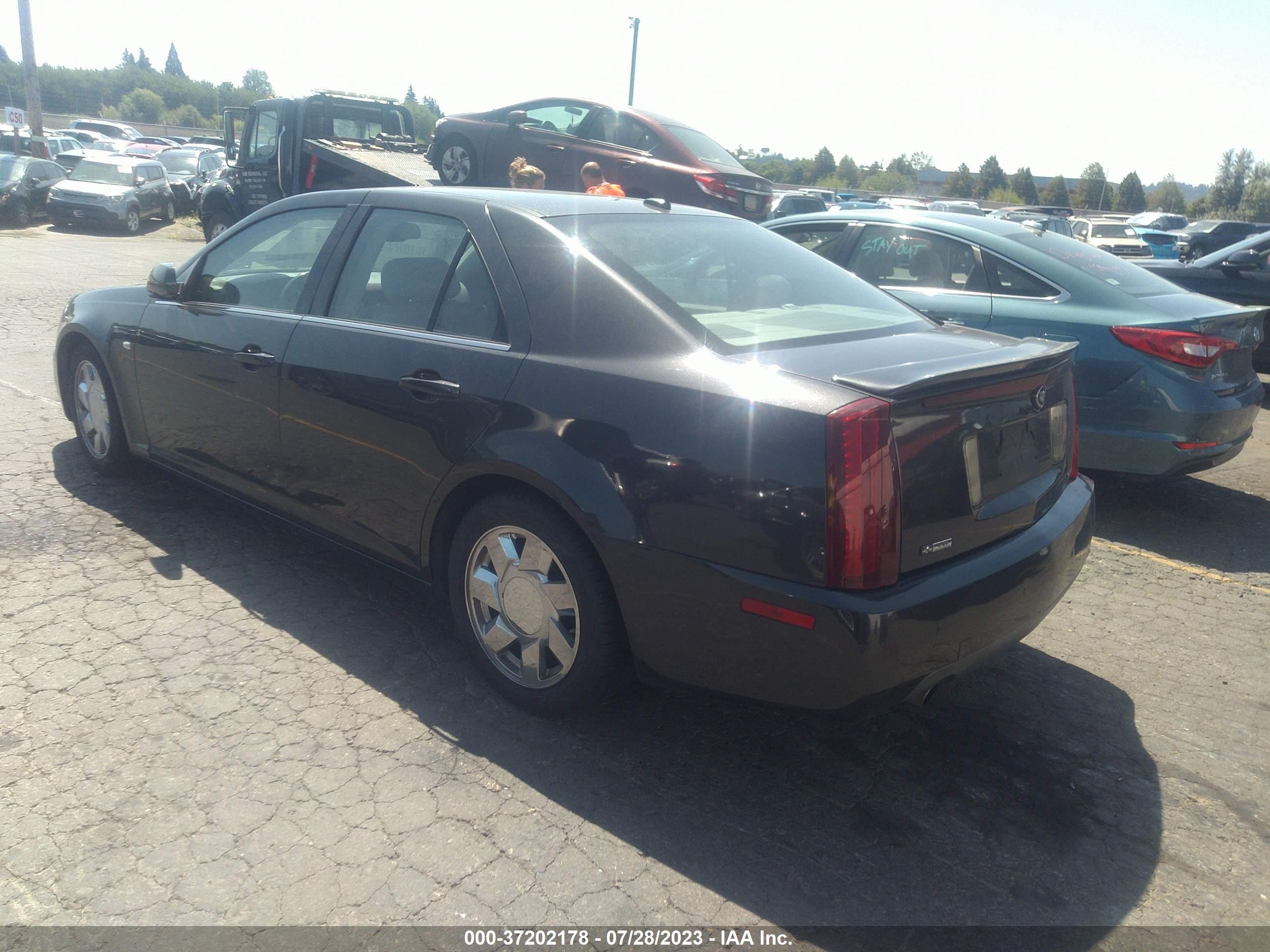 Photo 2 VIN: 1G6DC67A650210610 - CADILLAC STS 