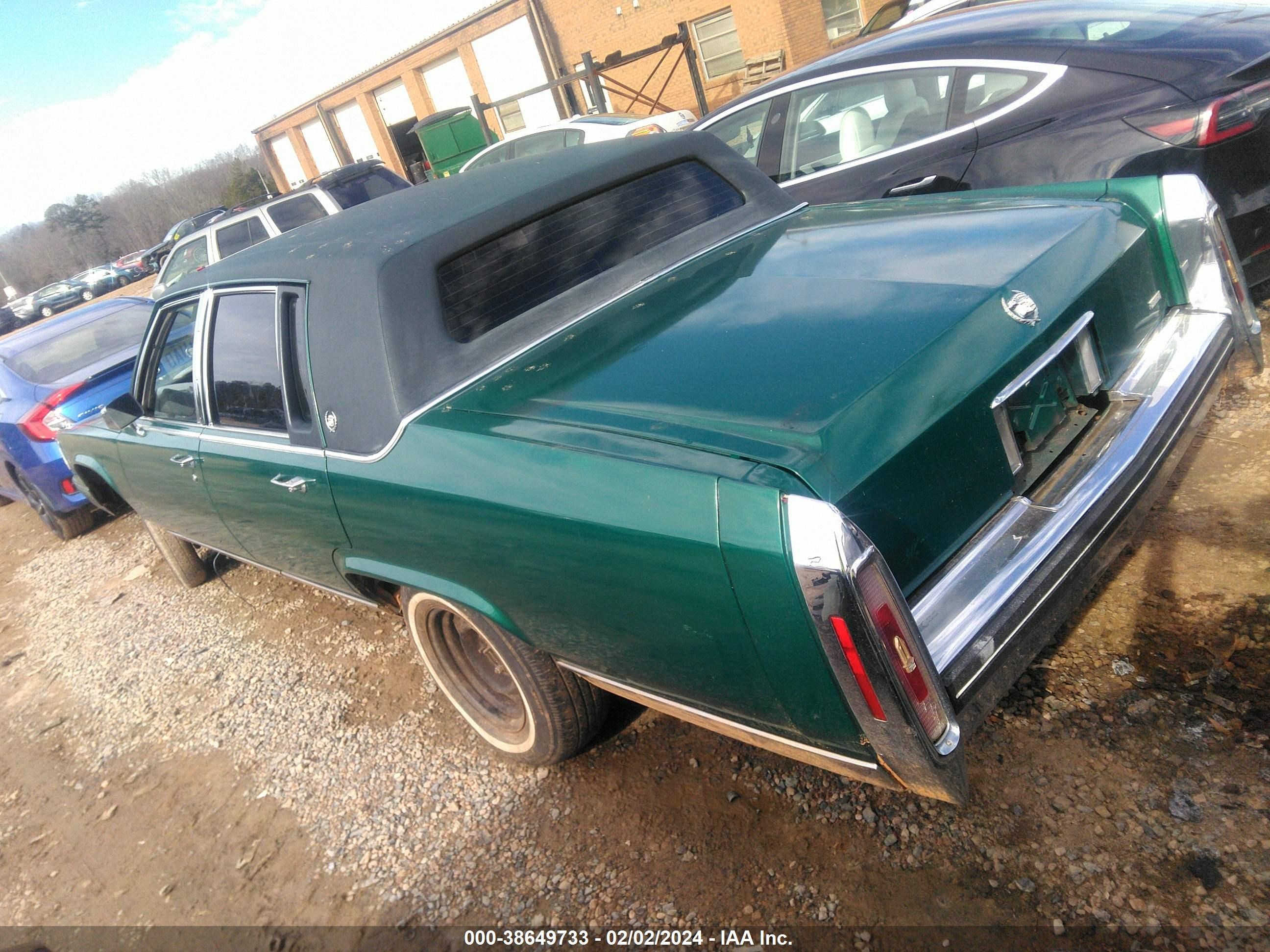 Photo 2 VIN: 1G6DW5473NR703277 - CADILLAC BROUGHAM 