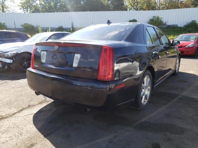 Photo 3 VIN: 1G6DW6ED3B0147272 - CADILLAC STS LUXURY 