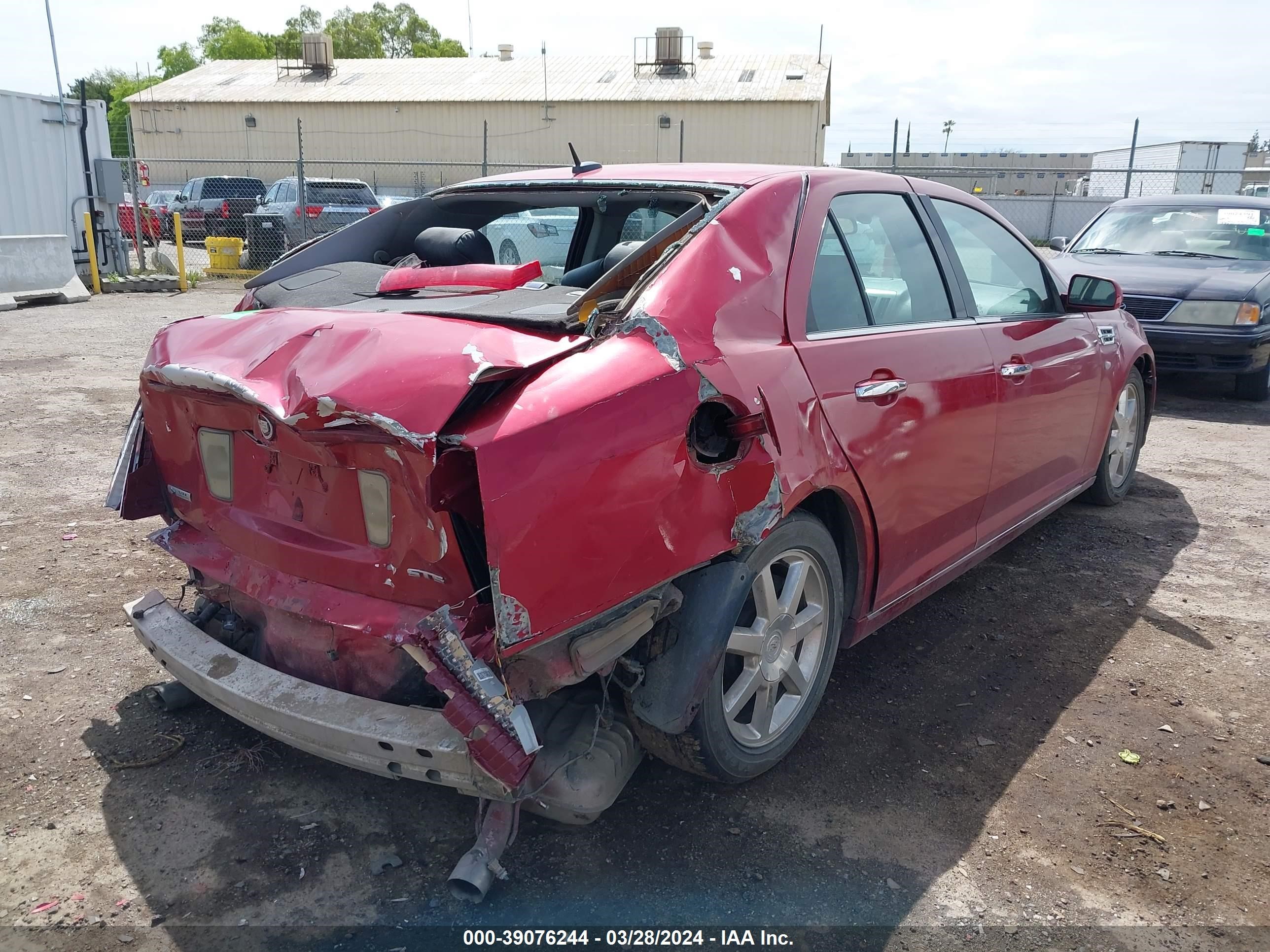 Photo 3 VIN: 1G6DZ67AX80176576 - CADILLAC STS 