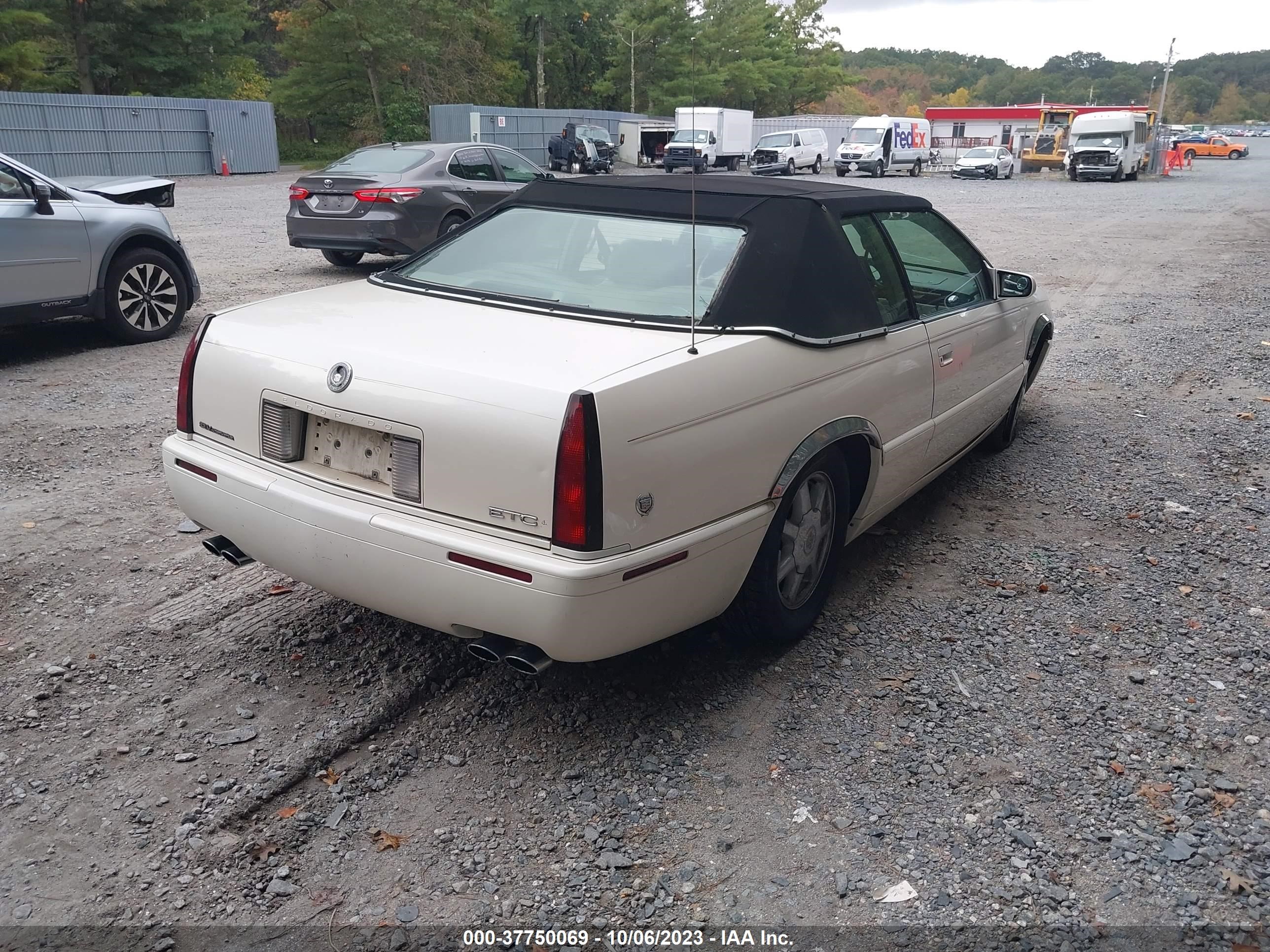 Photo 3 VIN: 1G6ET1293YB703299 - CADILLAC ELDORADO 