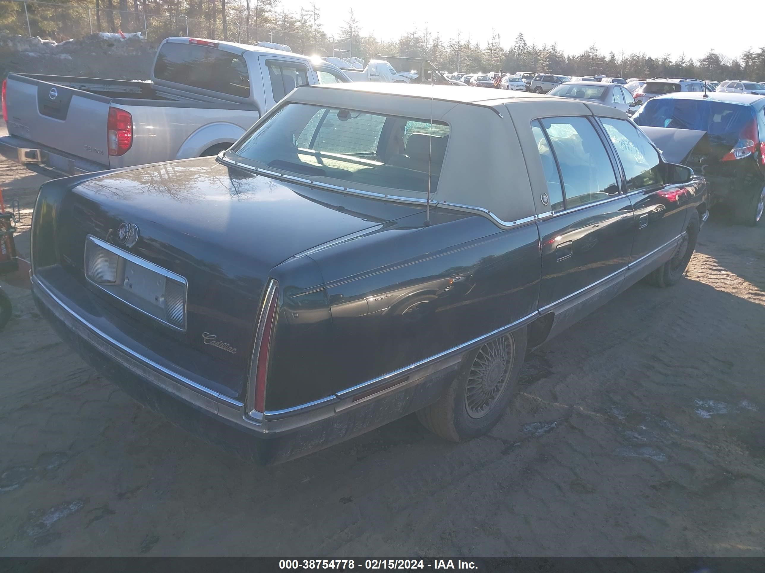 Photo 3 VIN: 1G6KD52B8RU318711 - CADILLAC DE VILLE 