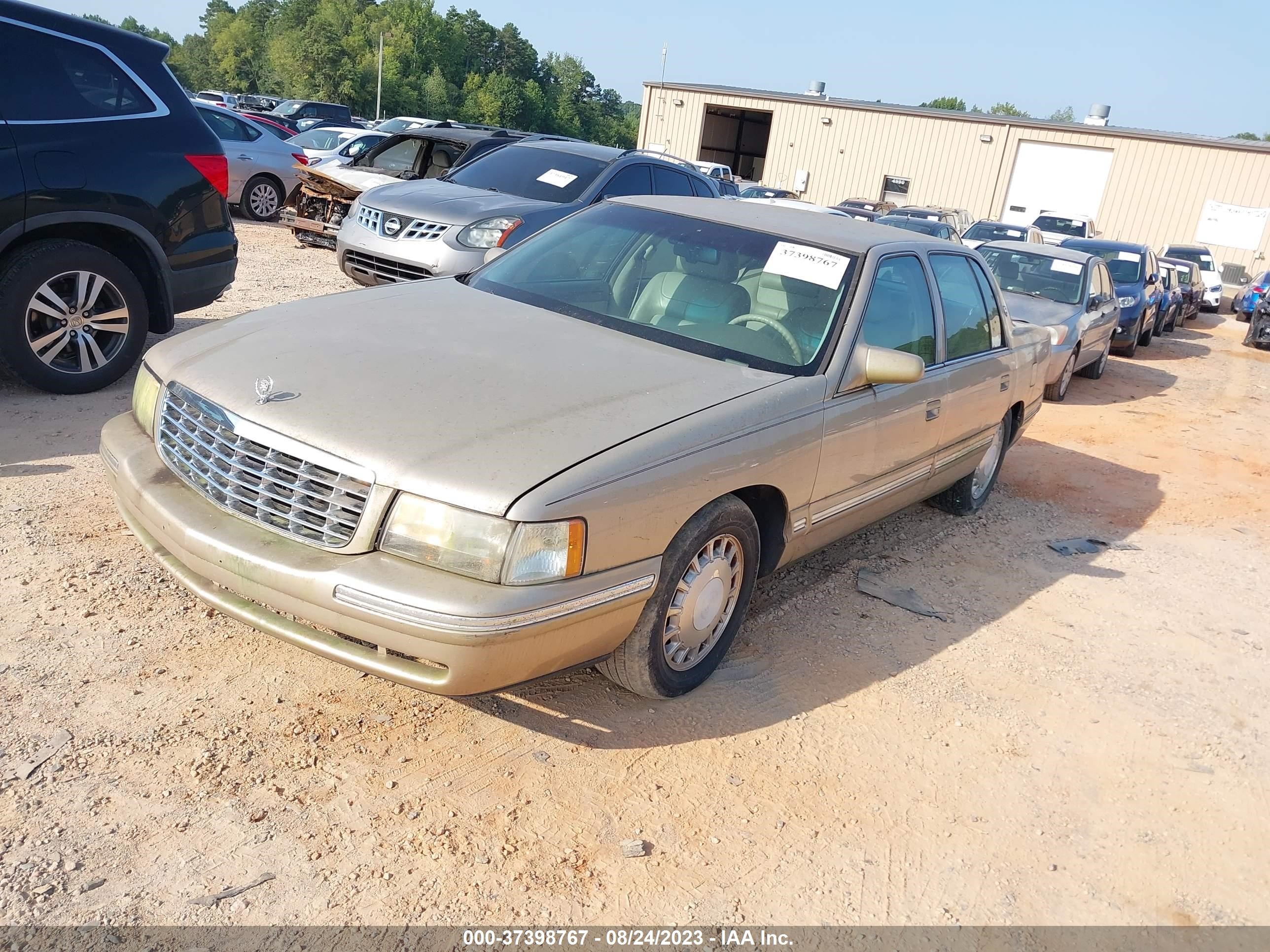 Photo 1 VIN: 1G6KD52YXVU215160 - CADILLAC DE VILLE 