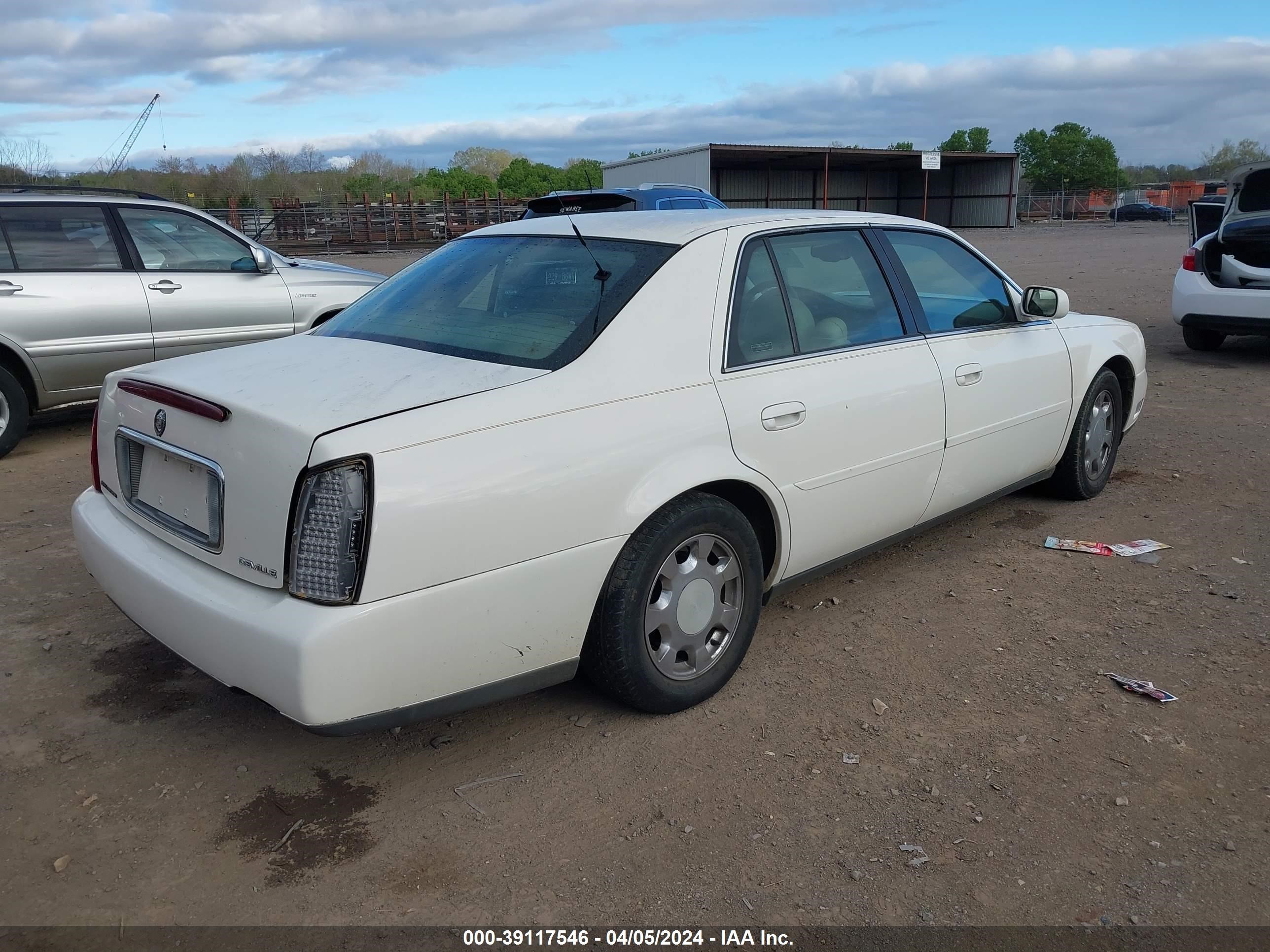 Photo 3 VIN: 1G6KD54Y01U104396 - CADILLAC DE VILLE 