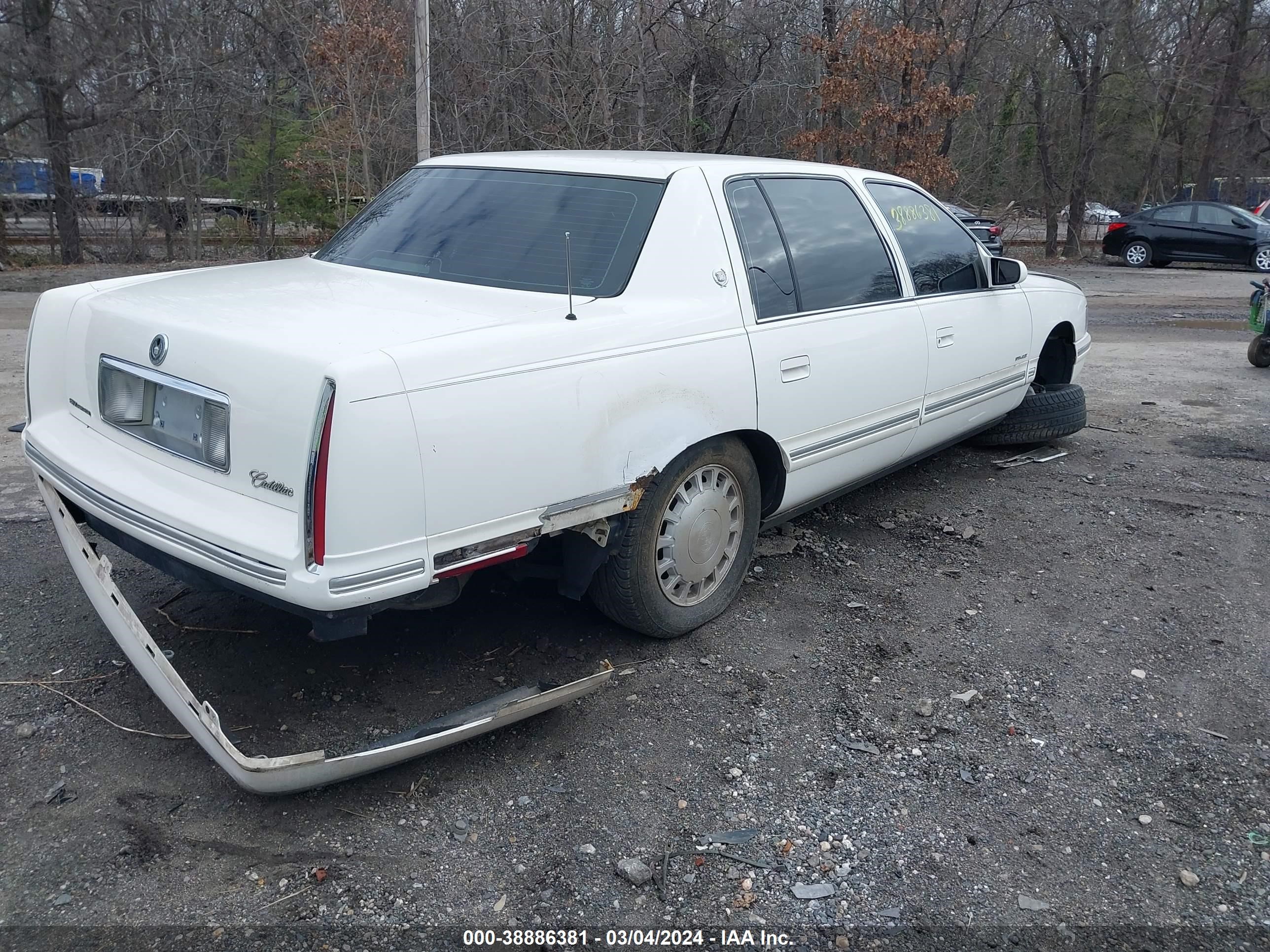 Photo 3 VIN: 1G6KD54Y2VU242057 - CADILLAC DE VILLE 