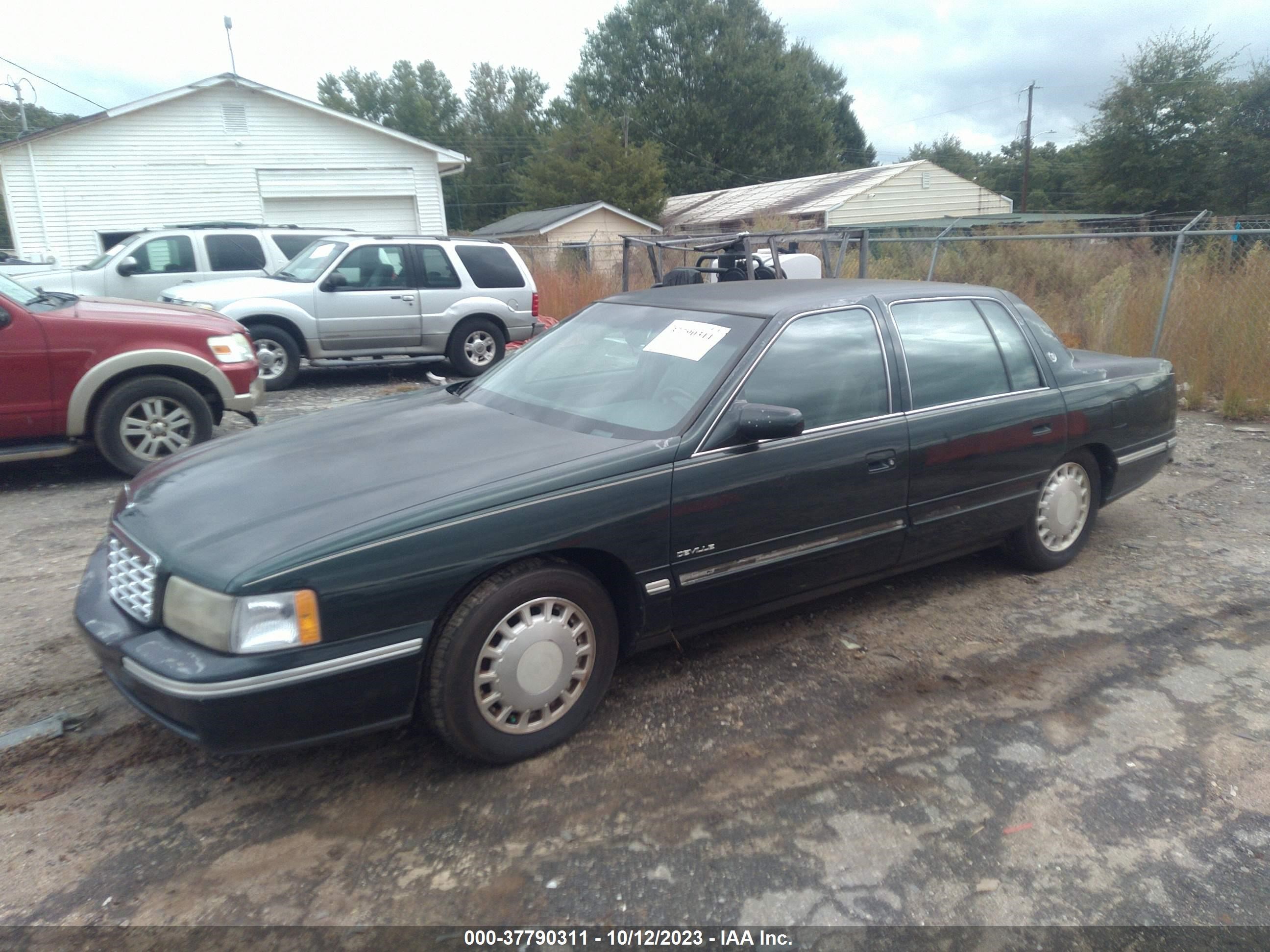 Photo 1 VIN: 1G6KD54Y2XU750497 - CADILLAC DE VILLE 