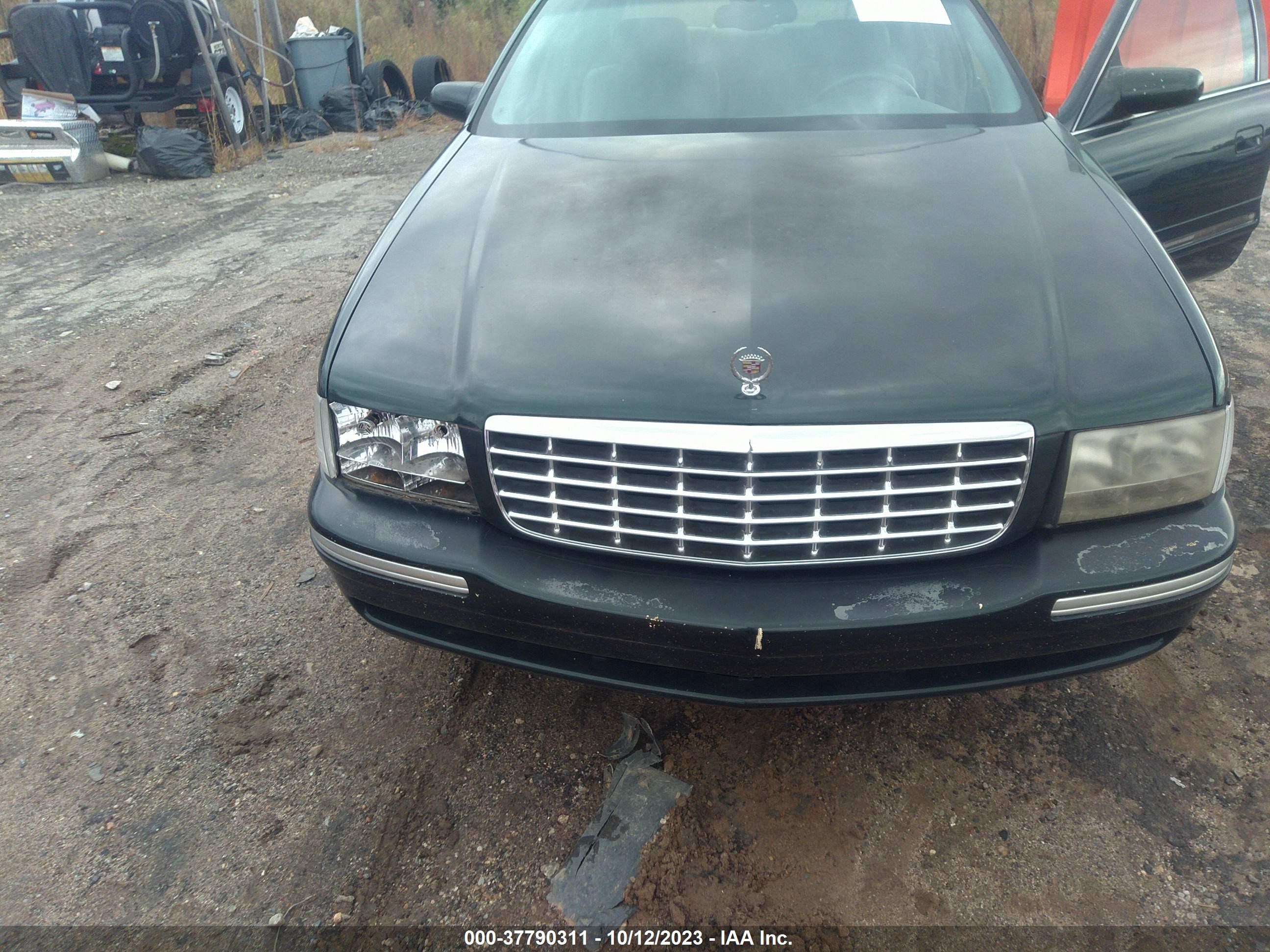 Photo 5 VIN: 1G6KD54Y2XU750497 - CADILLAC DE VILLE 