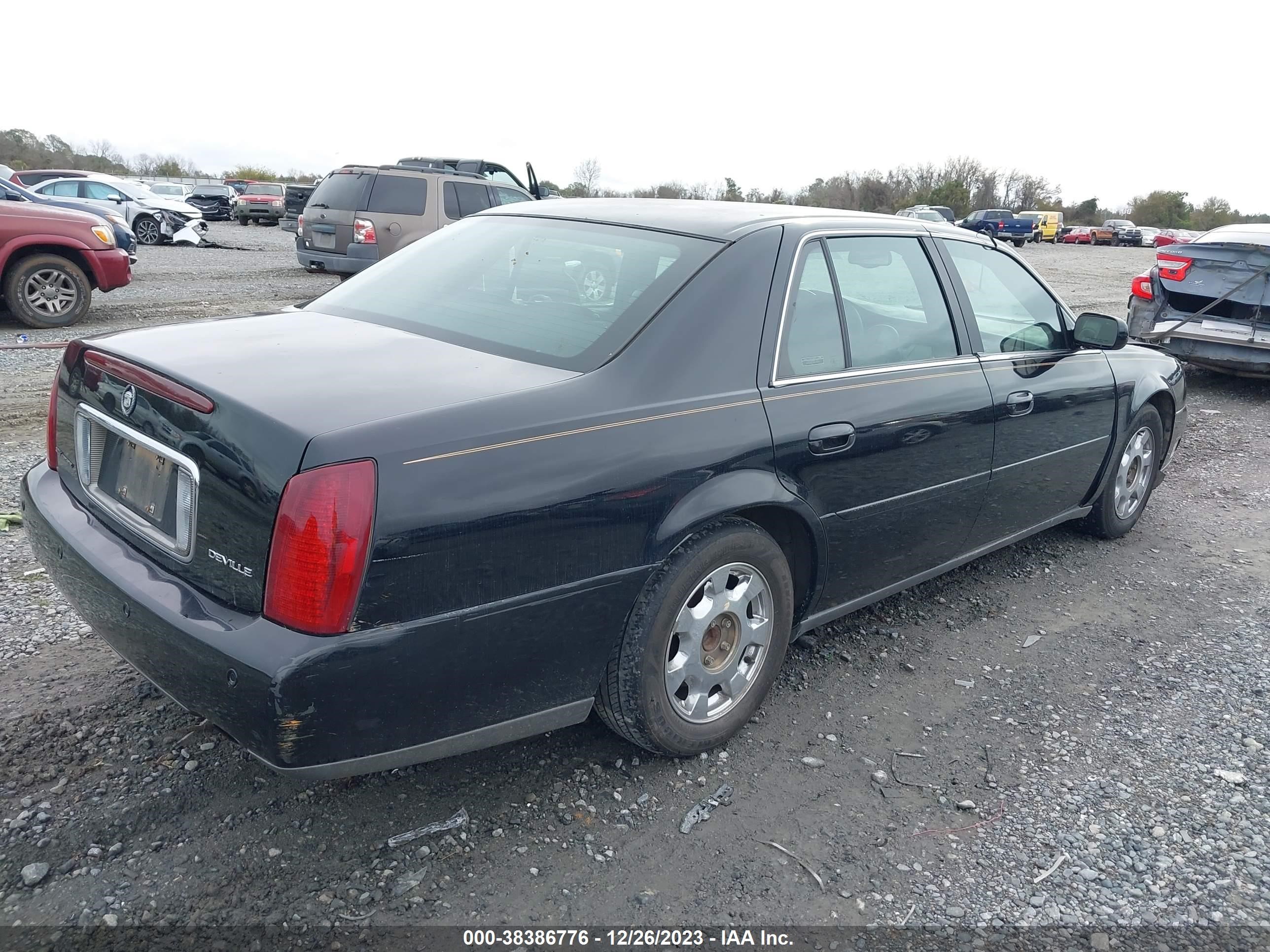 Photo 3 VIN: 1G6KD54Y5YU164118 - CADILLAC DE VILLE 