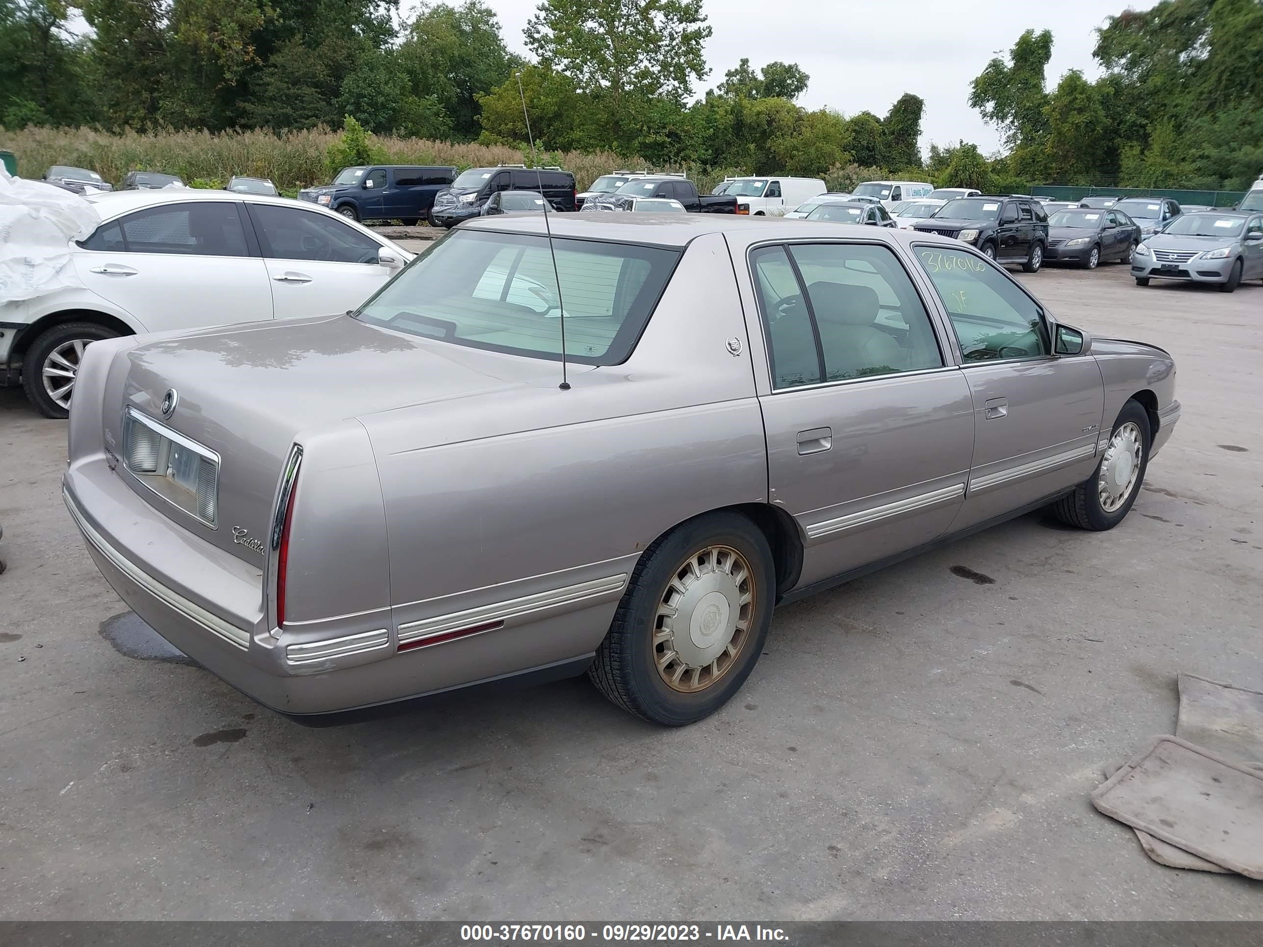 Photo 3 VIN: 1G6KD54Y6VU265938 - CADILLAC DE VILLE 