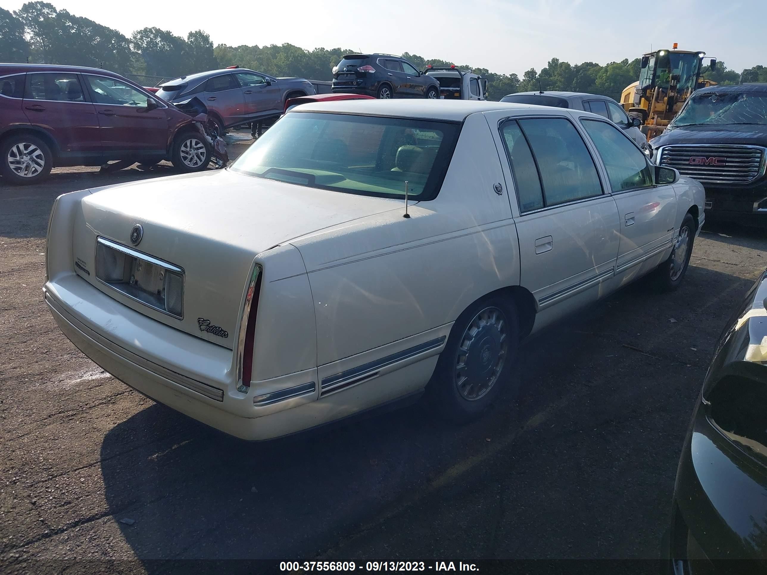 Photo 3 VIN: 1G6KD54Y7XU709184 - CADILLAC DE VILLE 