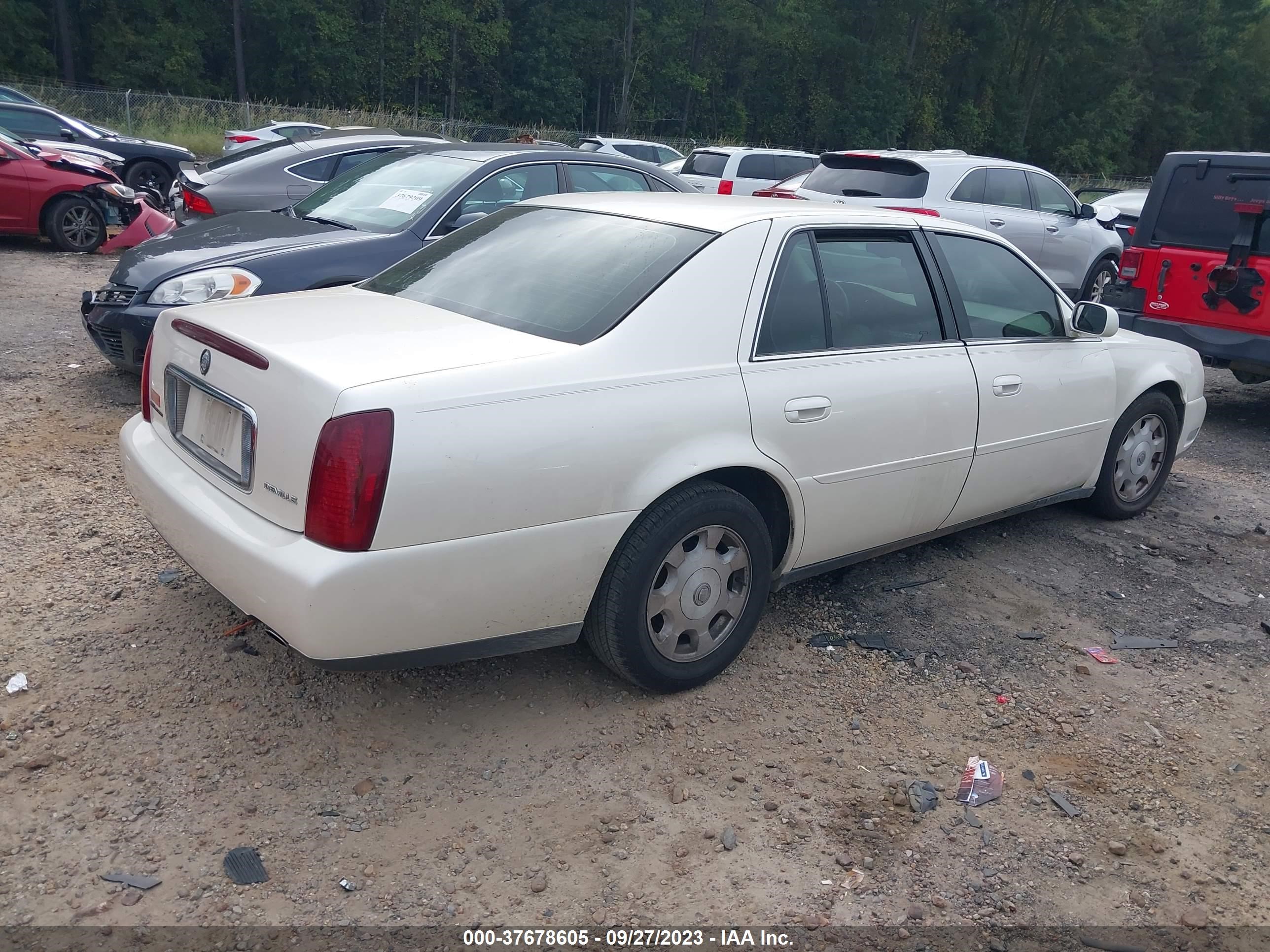 Photo 3 VIN: 1G6KD54Y8YU185397 - CADILLAC DE VILLE 