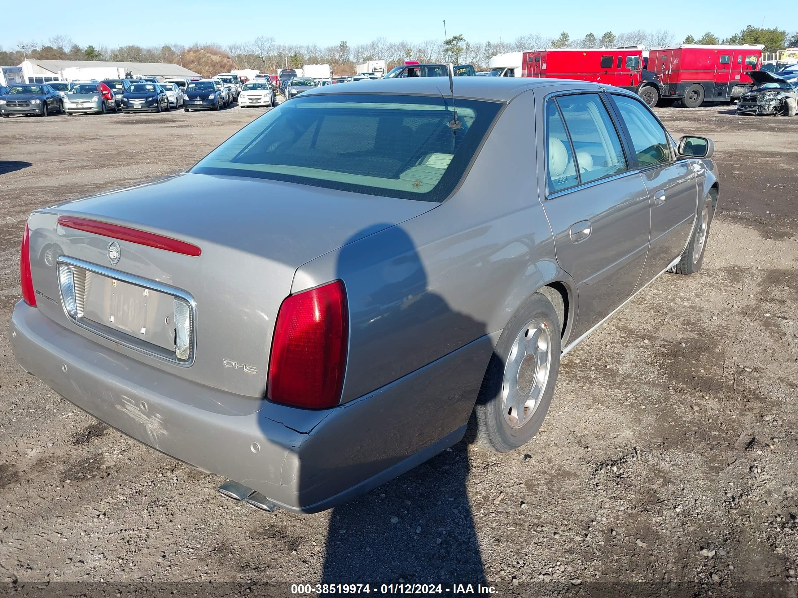 Photo 3 VIN: 1G6KE57Y1YU348822 - CADILLAC DE VILLE 