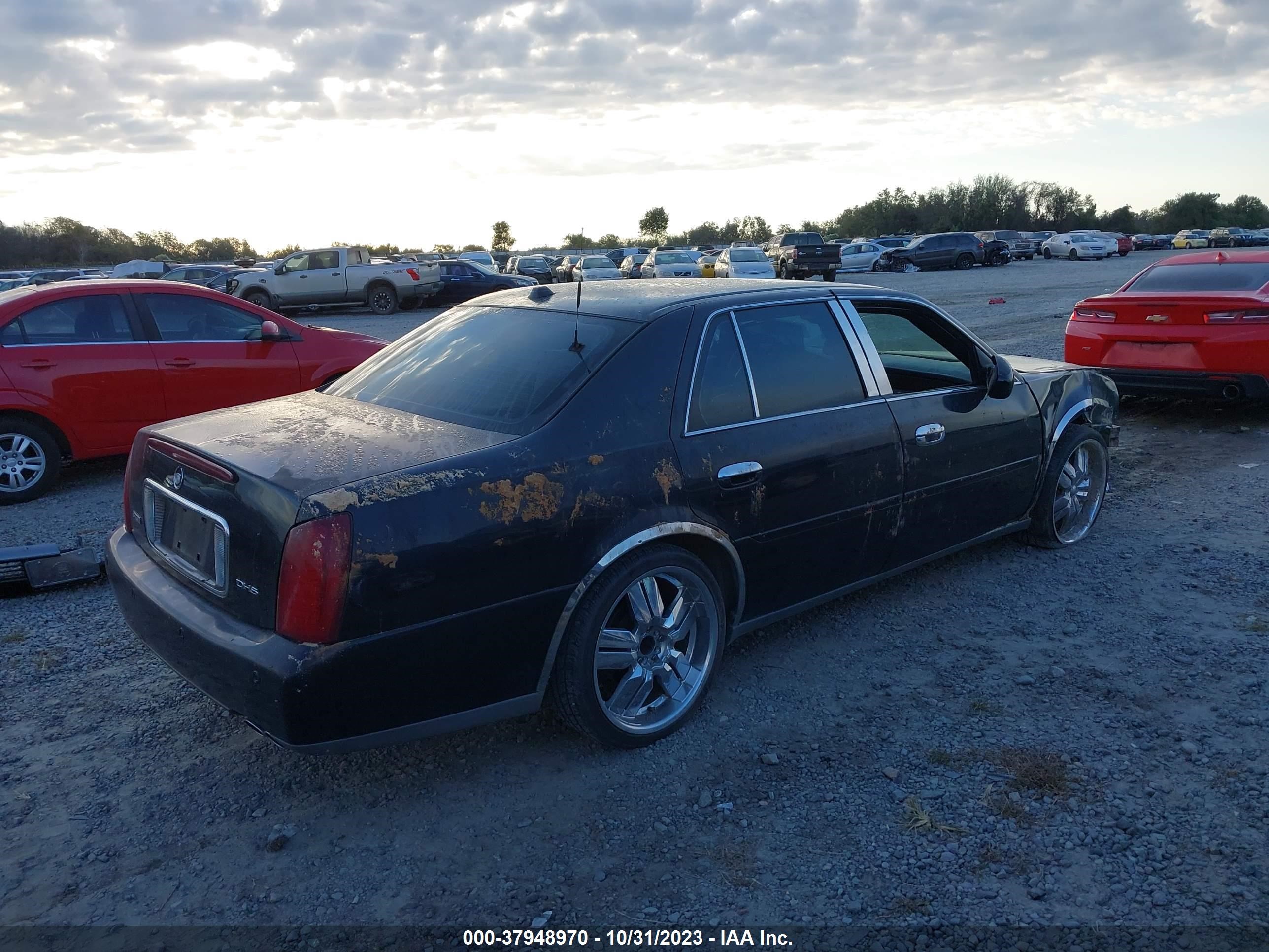 Photo 3 VIN: 1G6KE57Y84U134632 - CADILLAC DE VILLE 