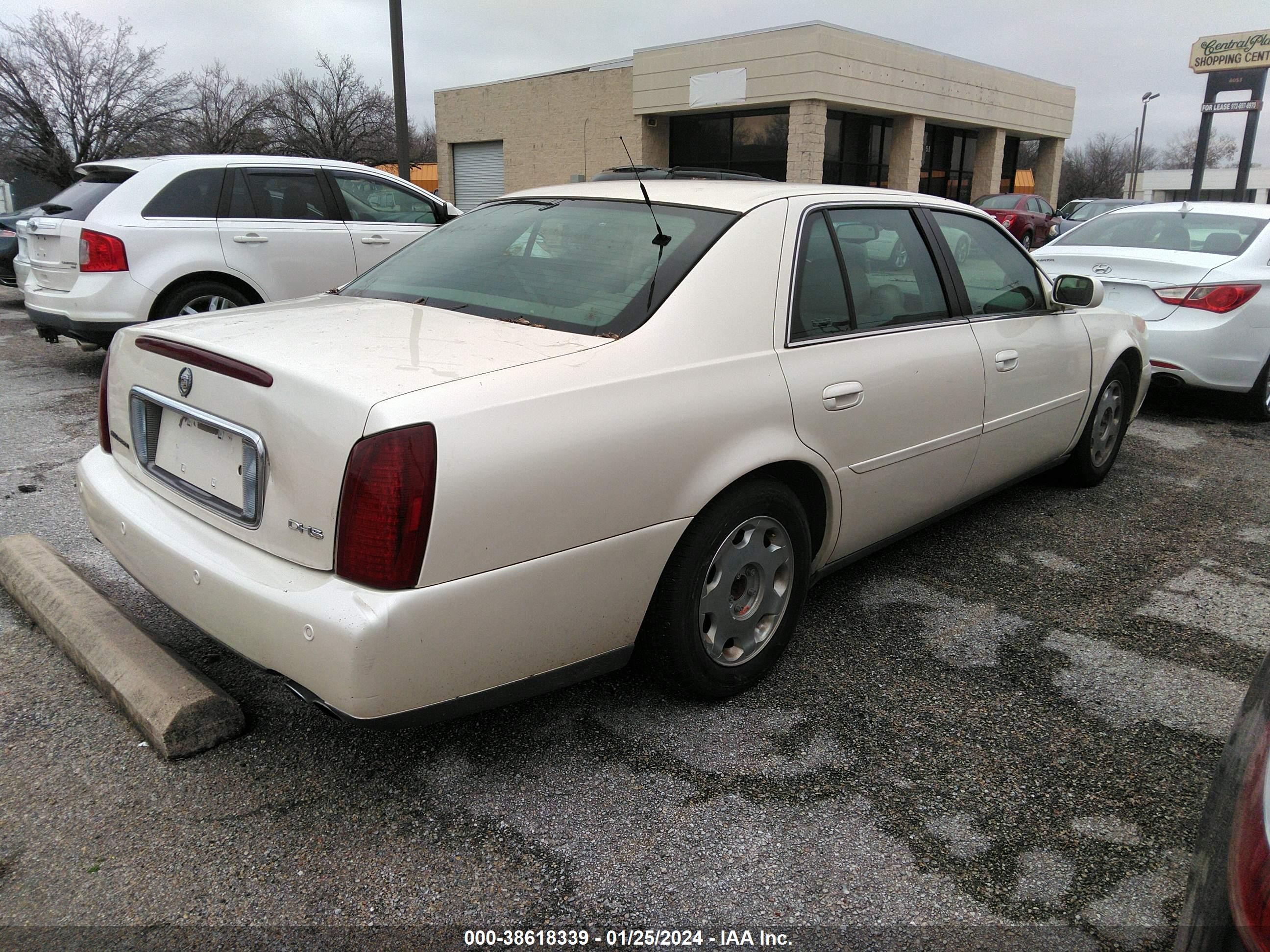 Photo 3 VIN: 1G6KE57Y8YU335968 - CADILLAC DE VILLE 