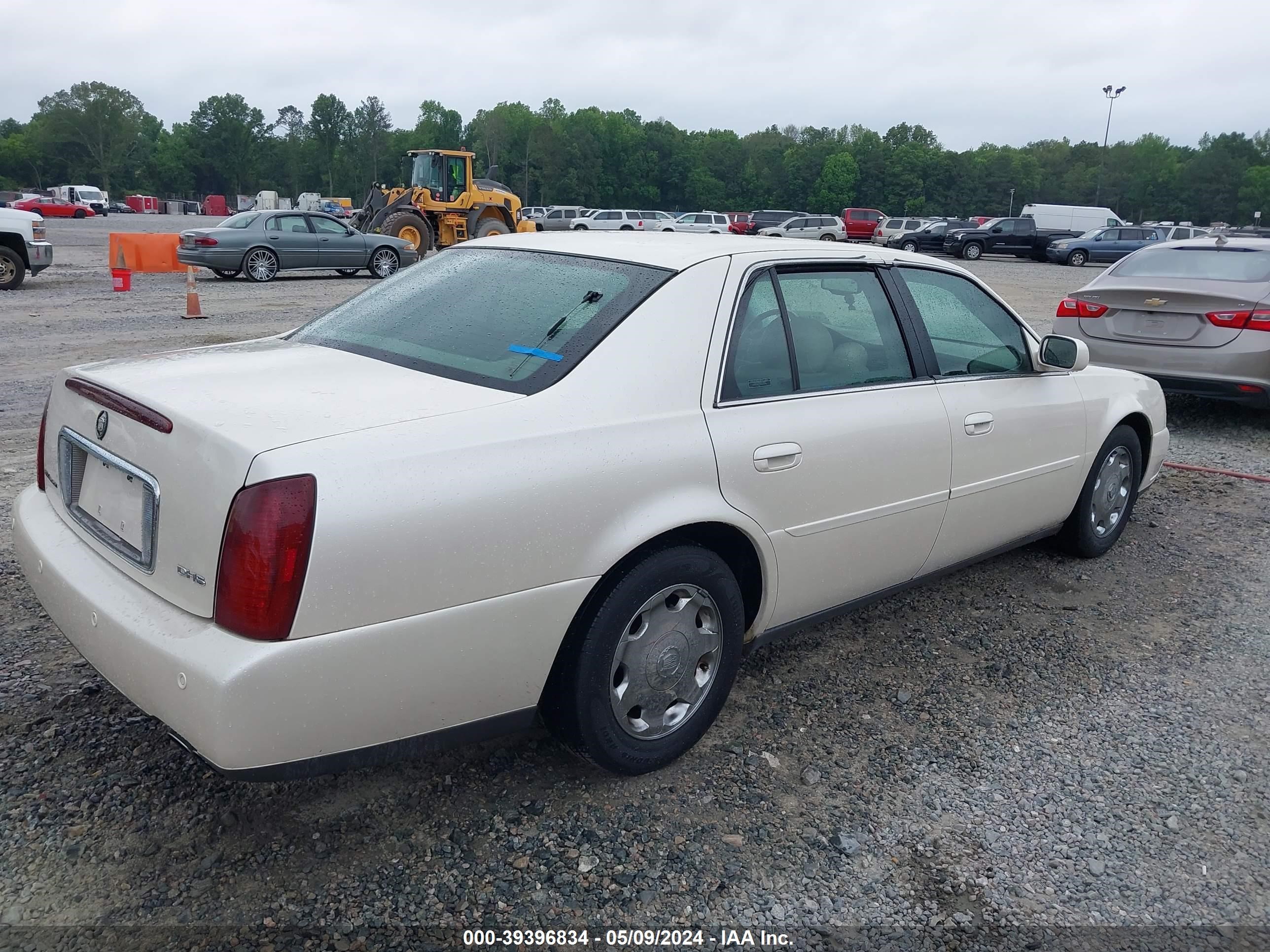 Photo 3 VIN: 1G6KE57YXYU318301 - CADILLAC DE VILLE 