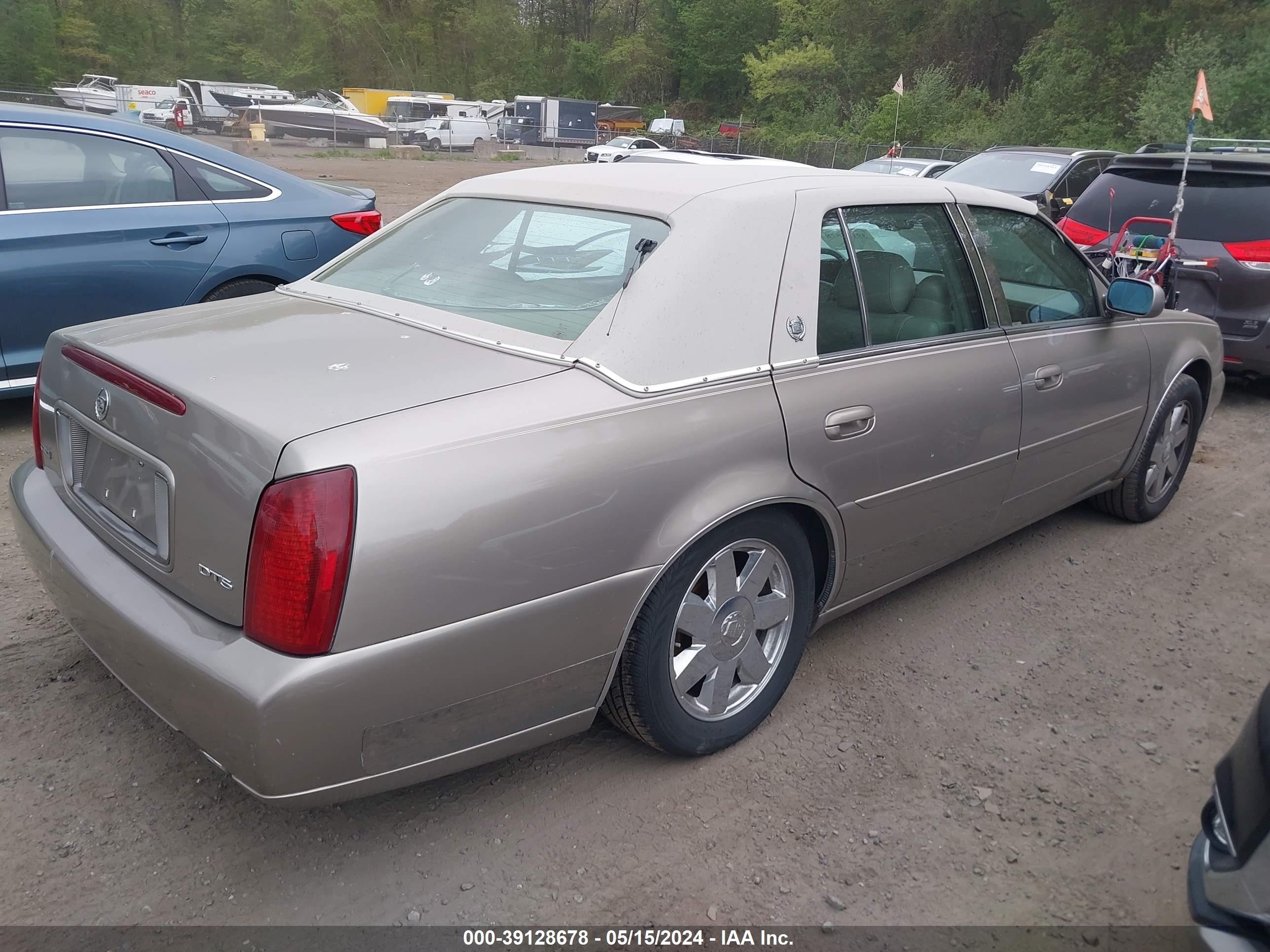 Photo 3 VIN: 1G6KF54914U260602 - CADILLAC DE VILLE 