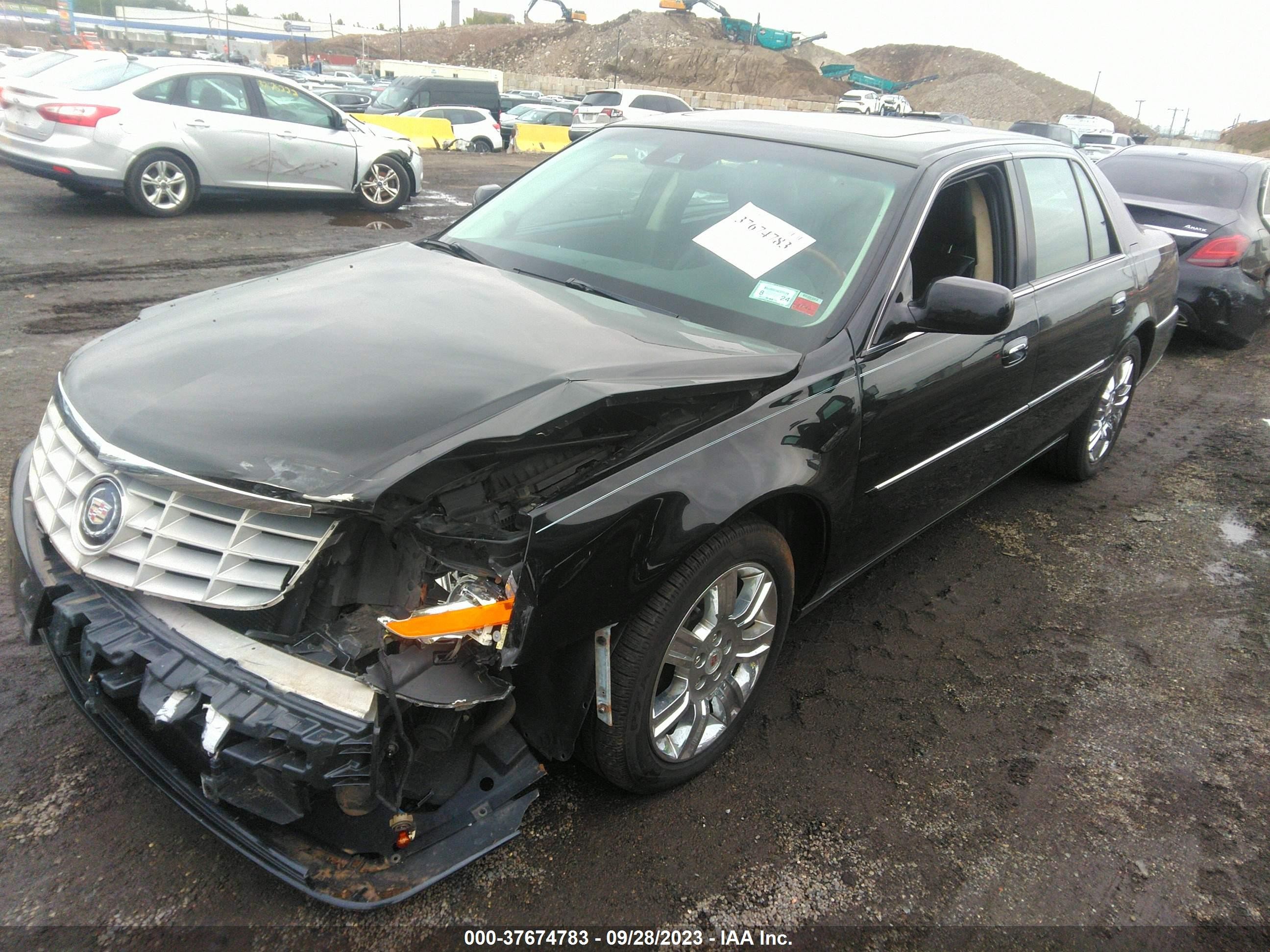 Photo 1 VIN: 1G6KP5ES2BU105889 - CADILLAC DTS 