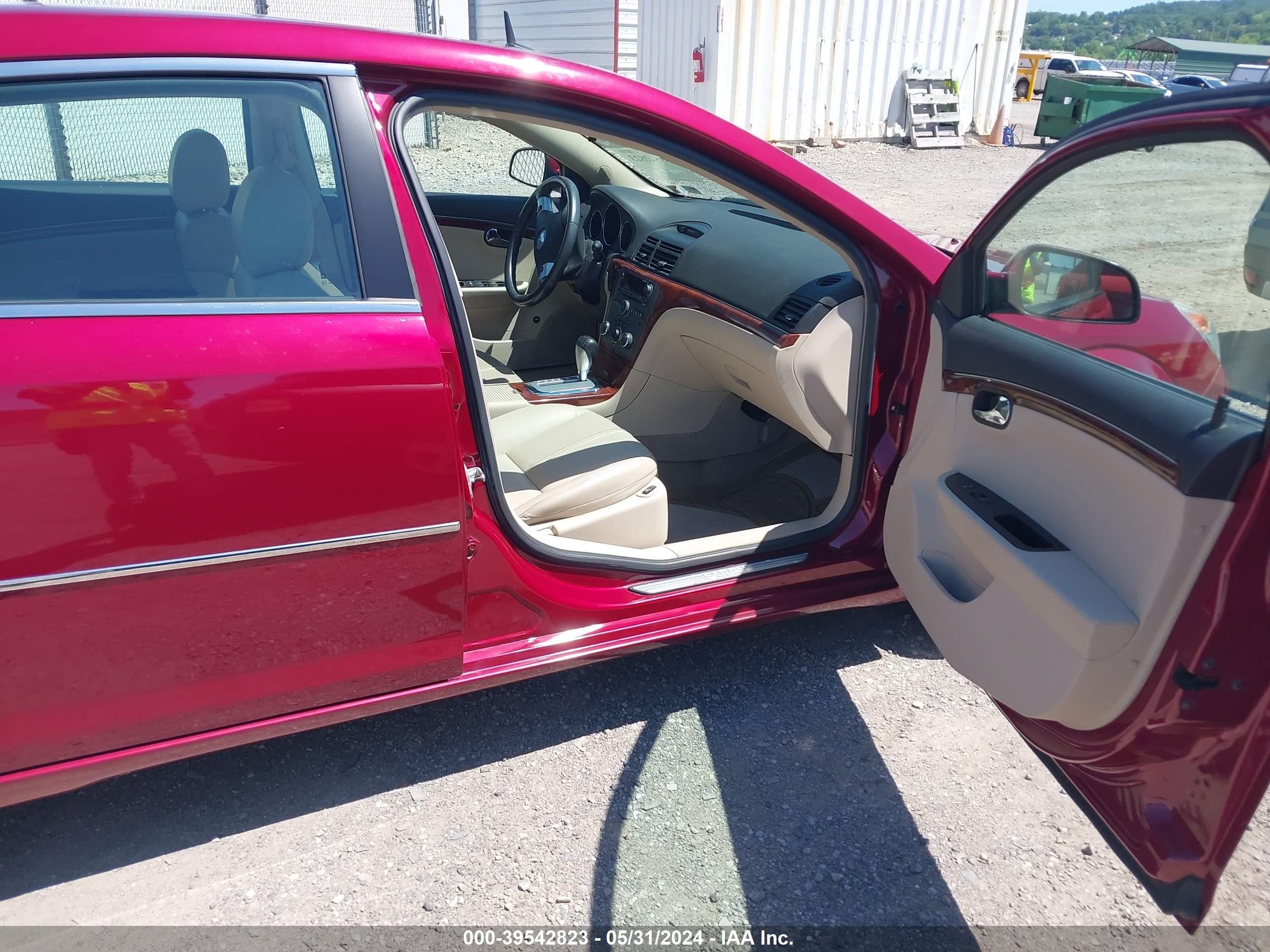 Photo 4 VIN: 1G8ZS57N17F186780 - SATURN AURA XE 