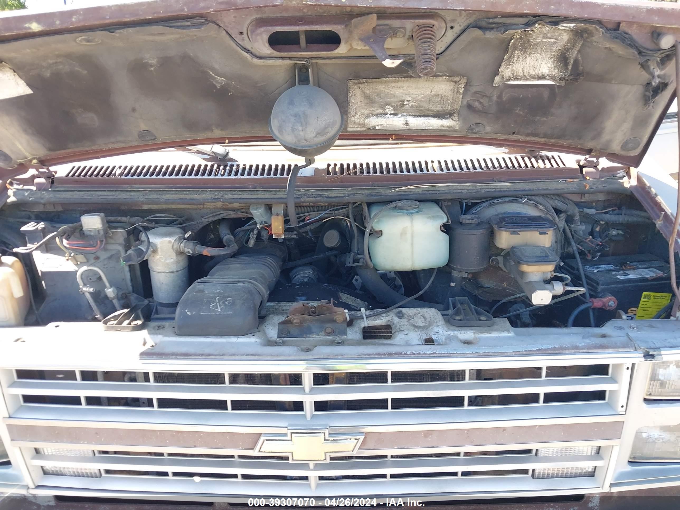 Photo 9 VIN: 1GBEG25K3K7159245 - CHEVROLET VAN 