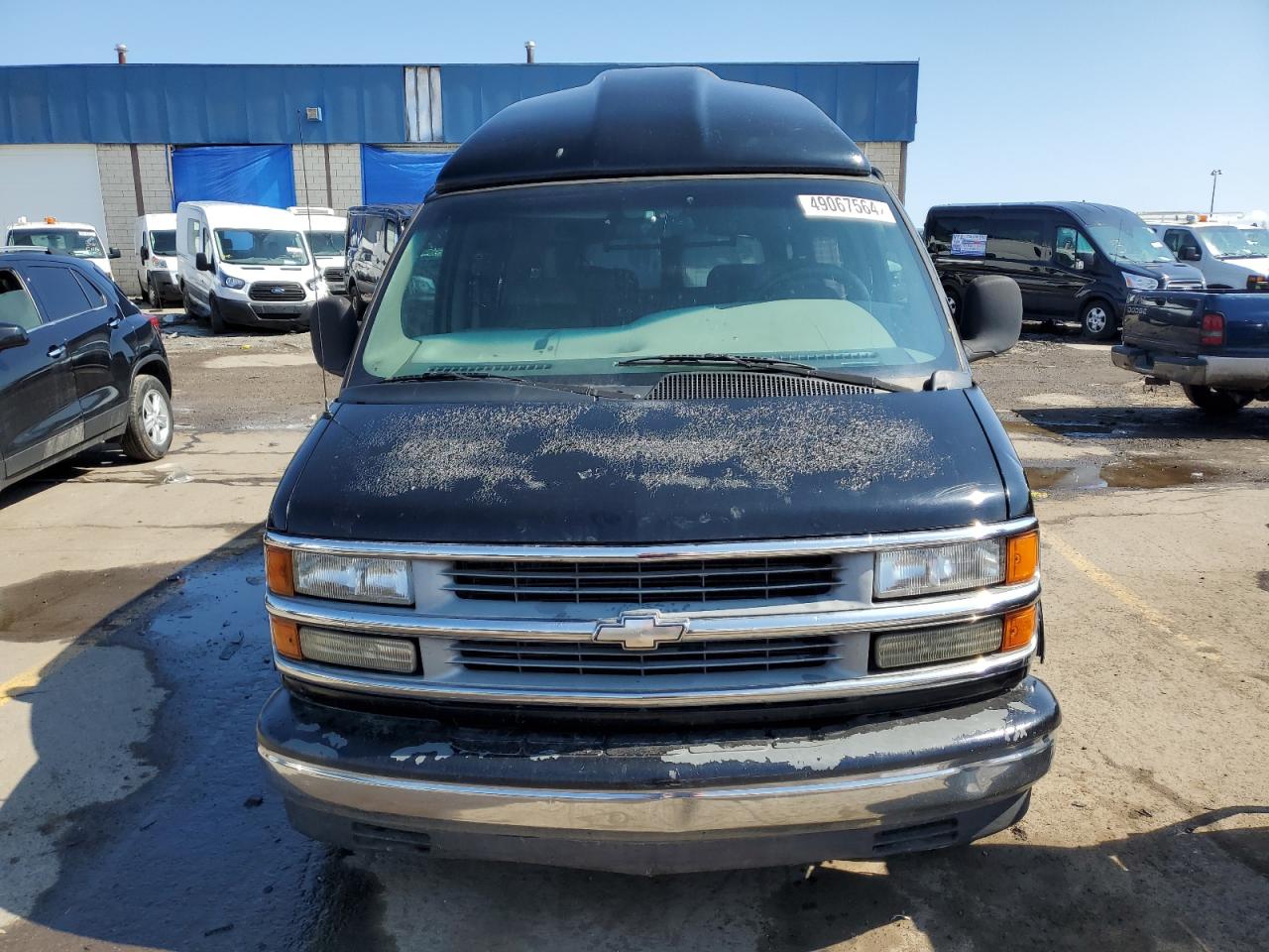 Photo 4 VIN: 1GBFG15R0T1017418 - CHEVROLET VAN 