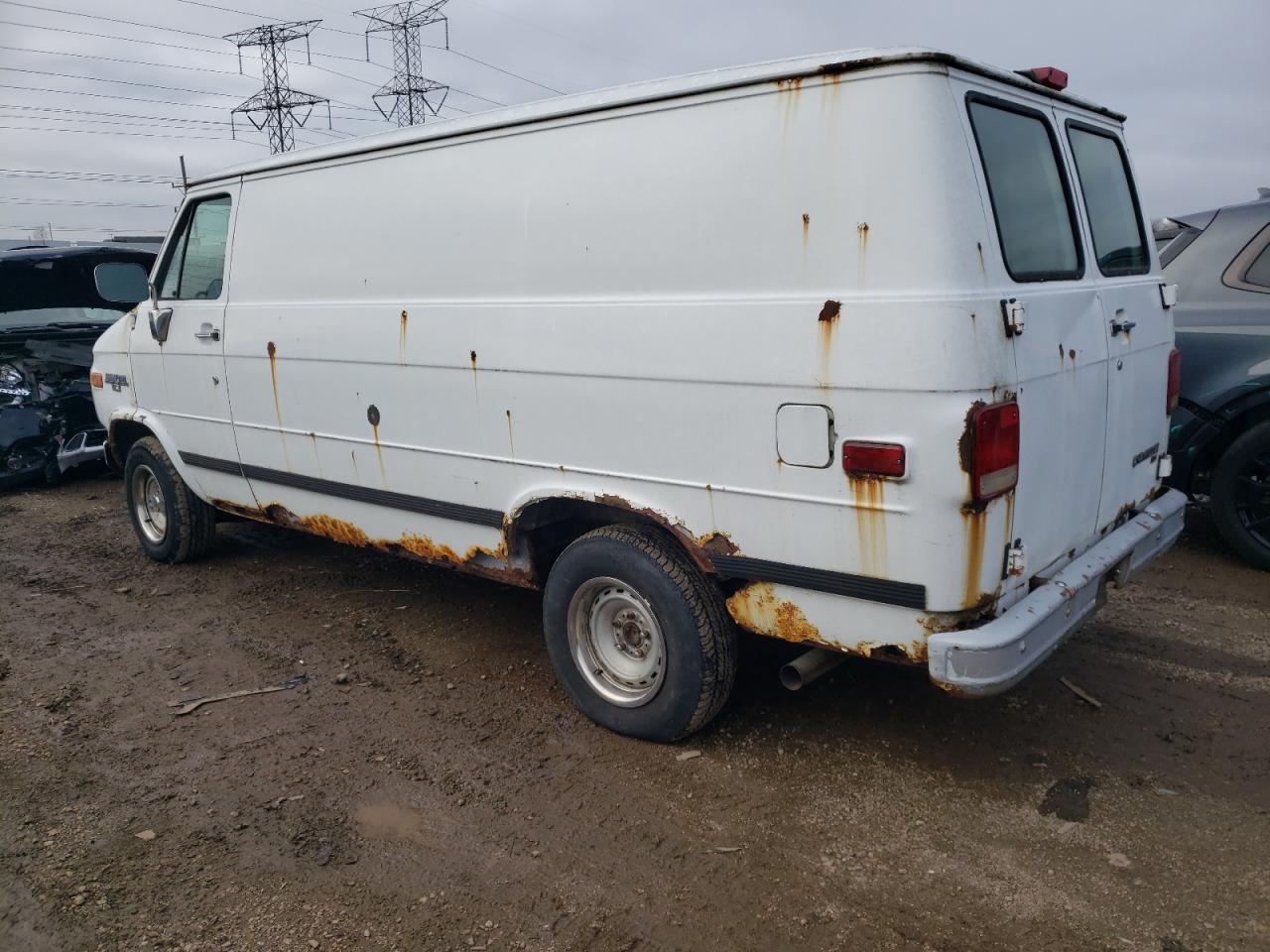 Photo 1 VIN: 1GCDG15H8SF127371 - CHEVROLET VAN 