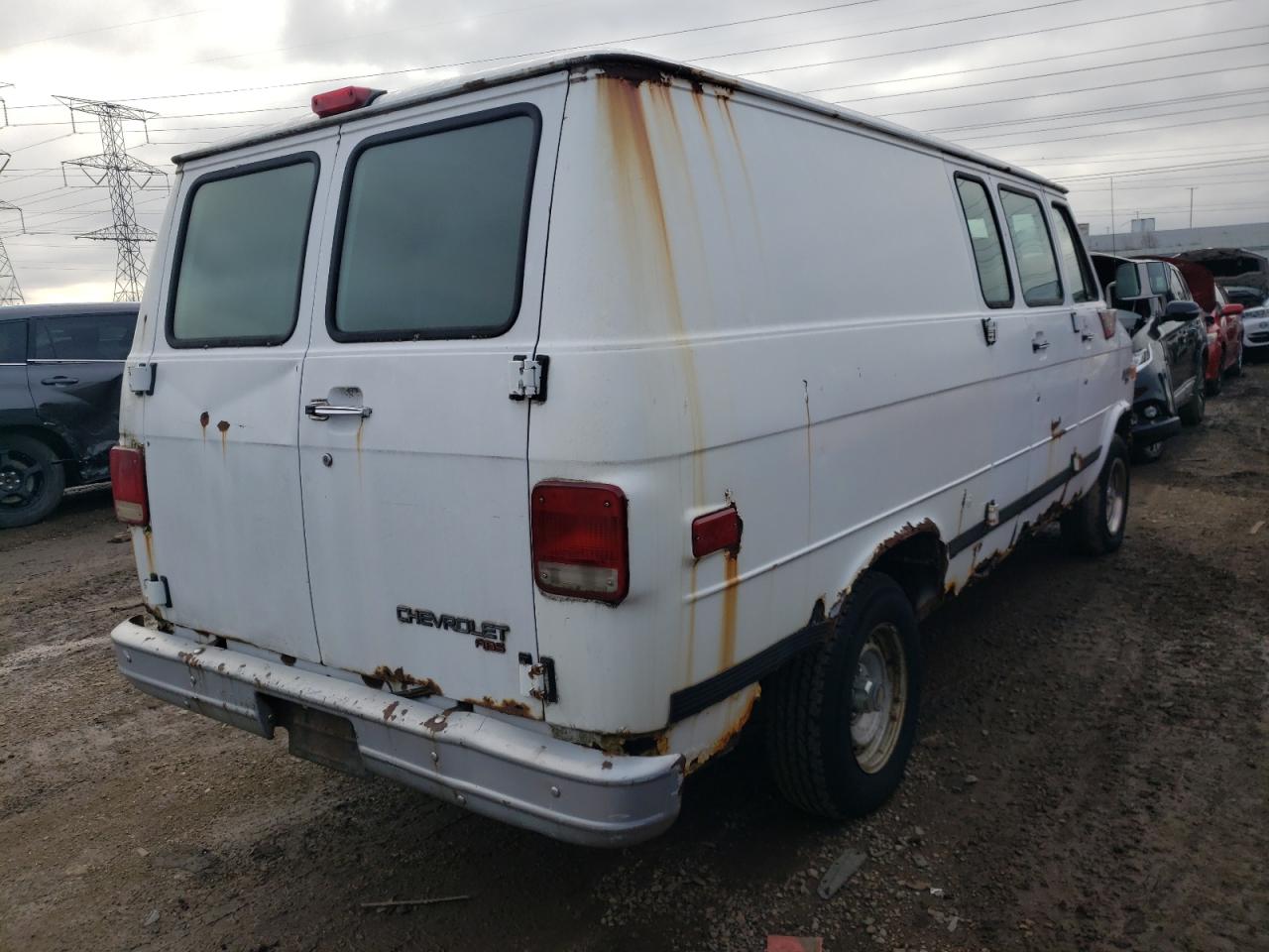 Photo 2 VIN: 1GCDG15H8SF127371 - CHEVROLET VAN 