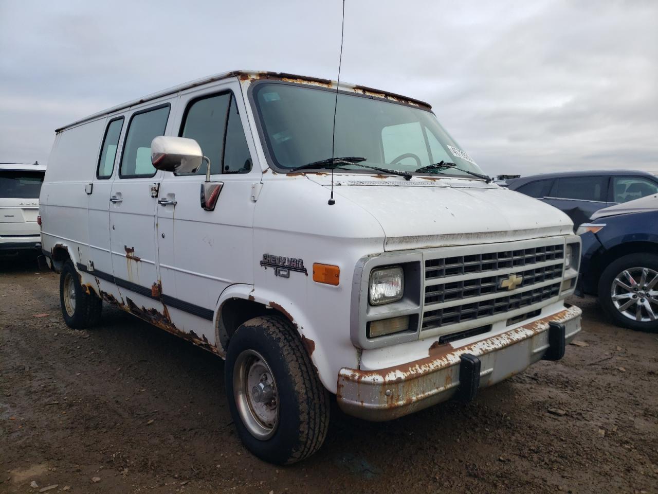 Photo 3 VIN: 1GCDG15H8SF127371 - CHEVROLET VAN 