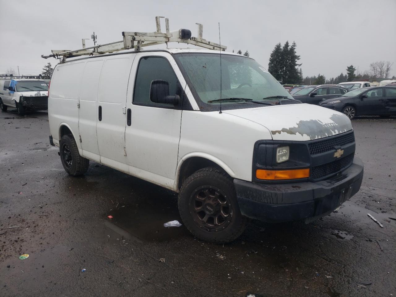 Photo 3 VIN: 1GCWGFBA1B1154034 - CHEVROLET EXPRESS 