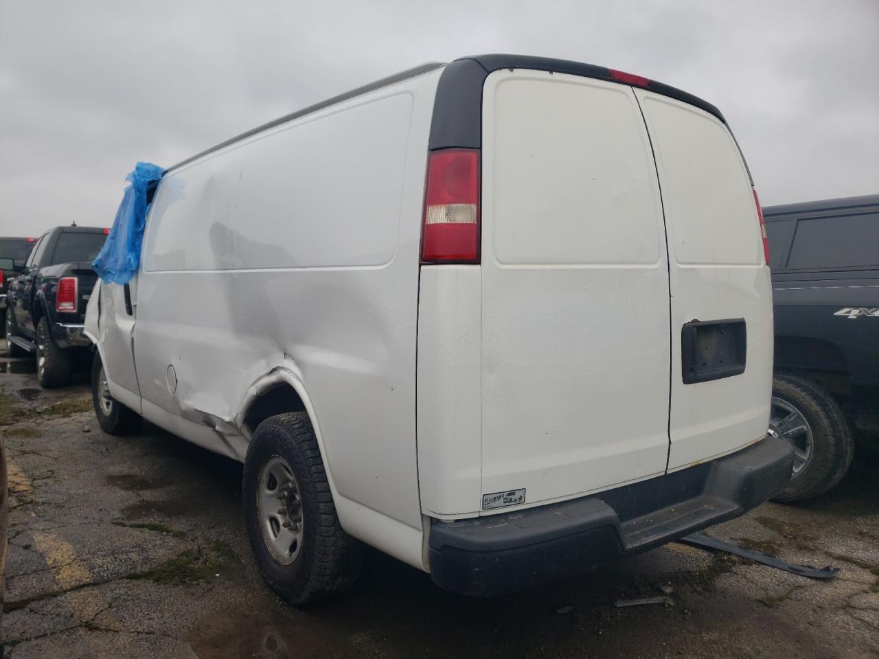 Photo 1 VIN: 1GCWGFBA9B1167260 - CHEVROLET EXPRESS 