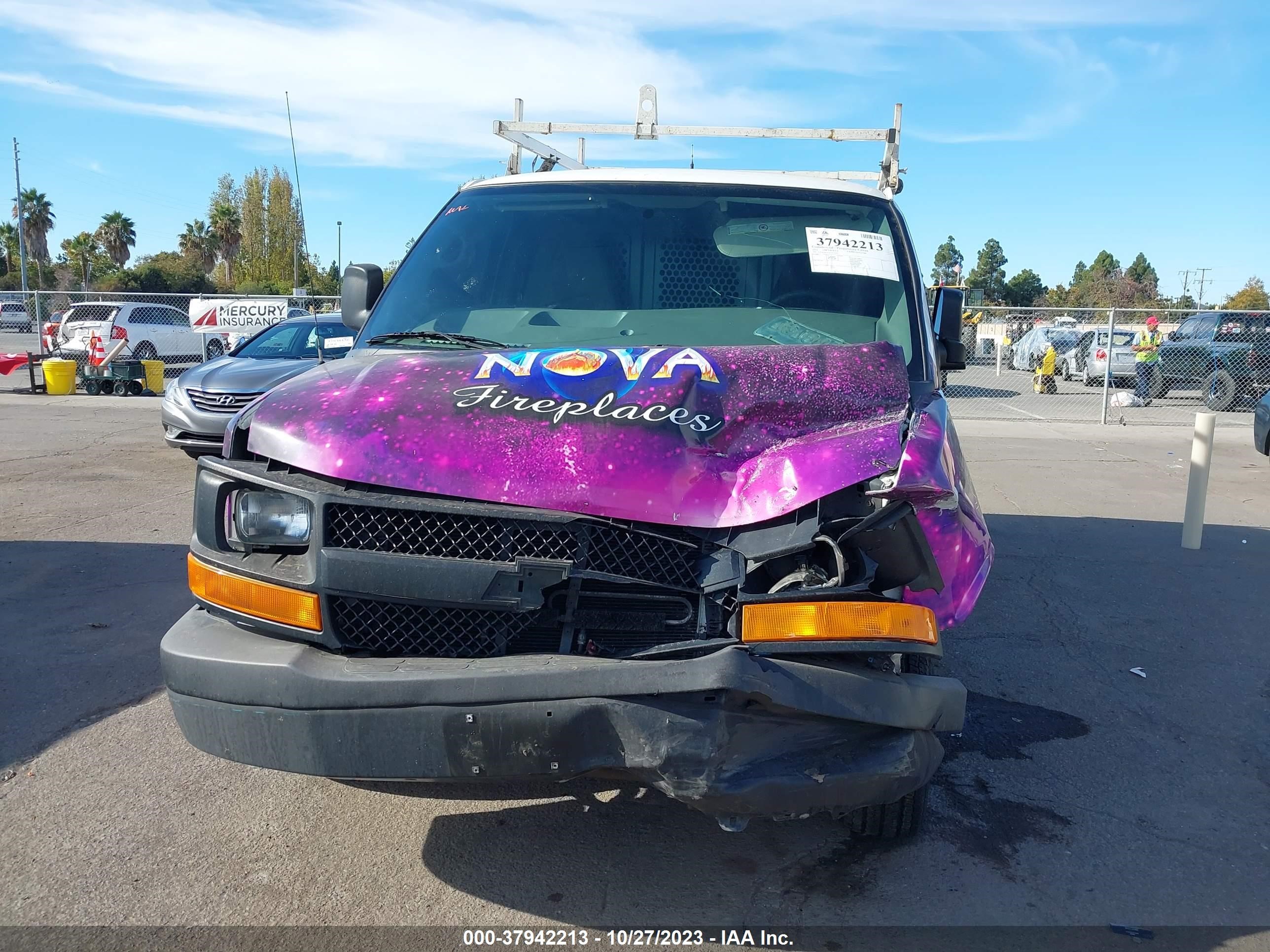 Photo 11 VIN: 1GCWGFCA5C1171418 - CHEVROLET EXPRESS 