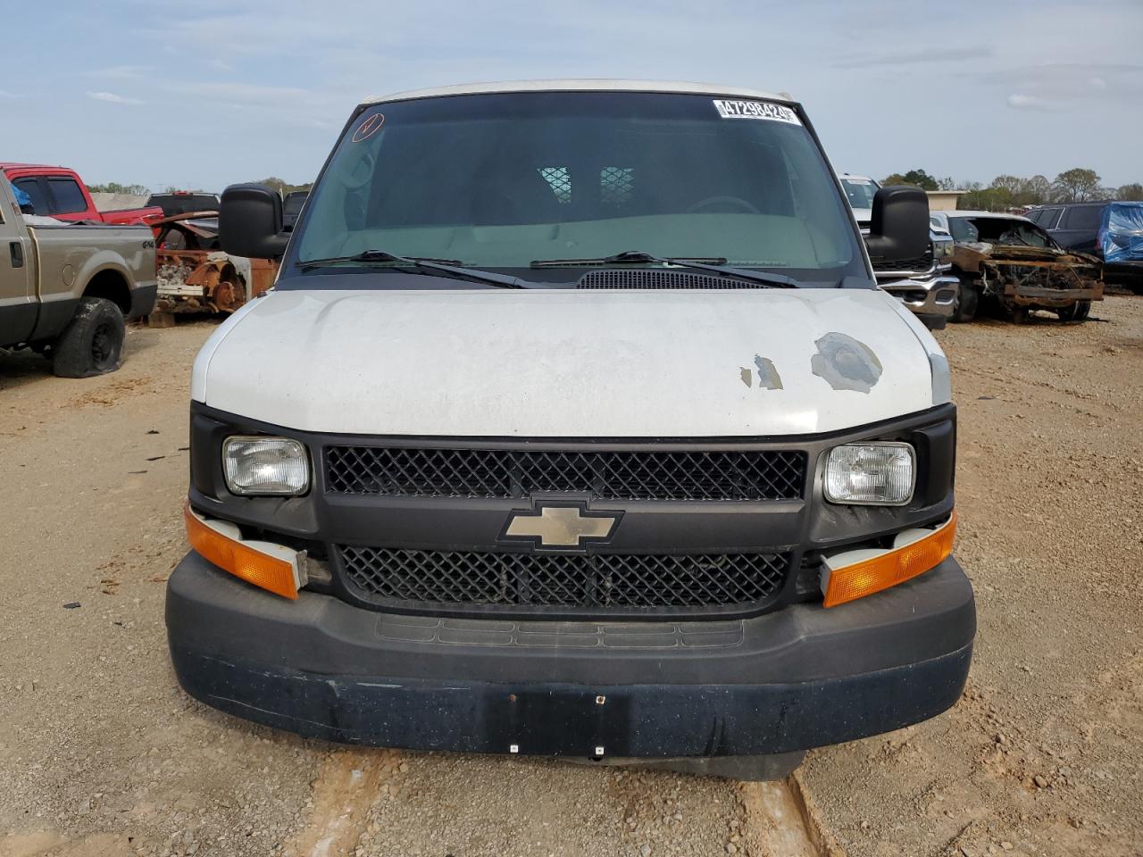 Photo 4 VIN: 1GCWGFCA6B1140404 - CHEVROLET EXPRESS 