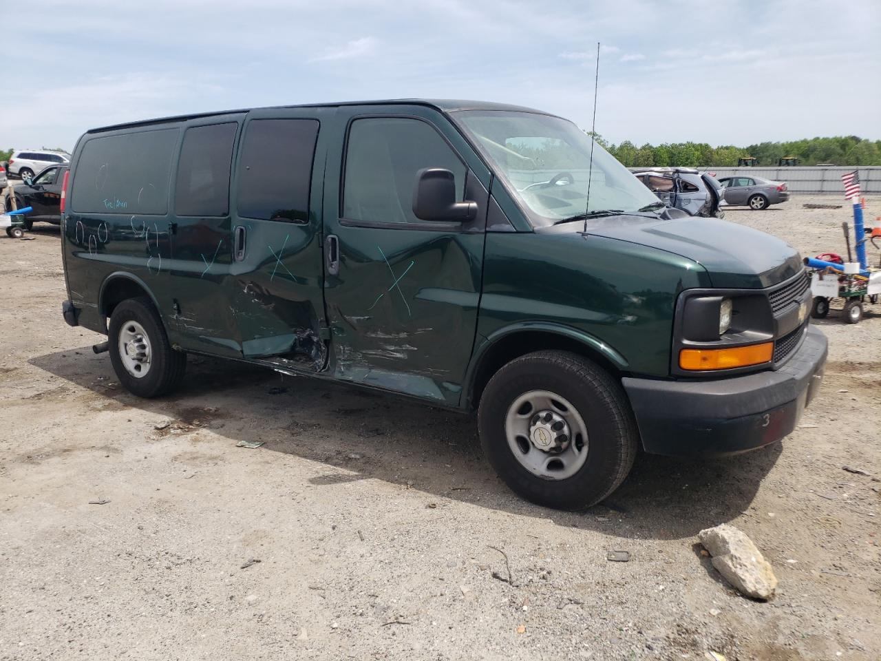 Photo 3 VIN: 1GCWGFCA7B1154327 - CHEVROLET EXPRESS 