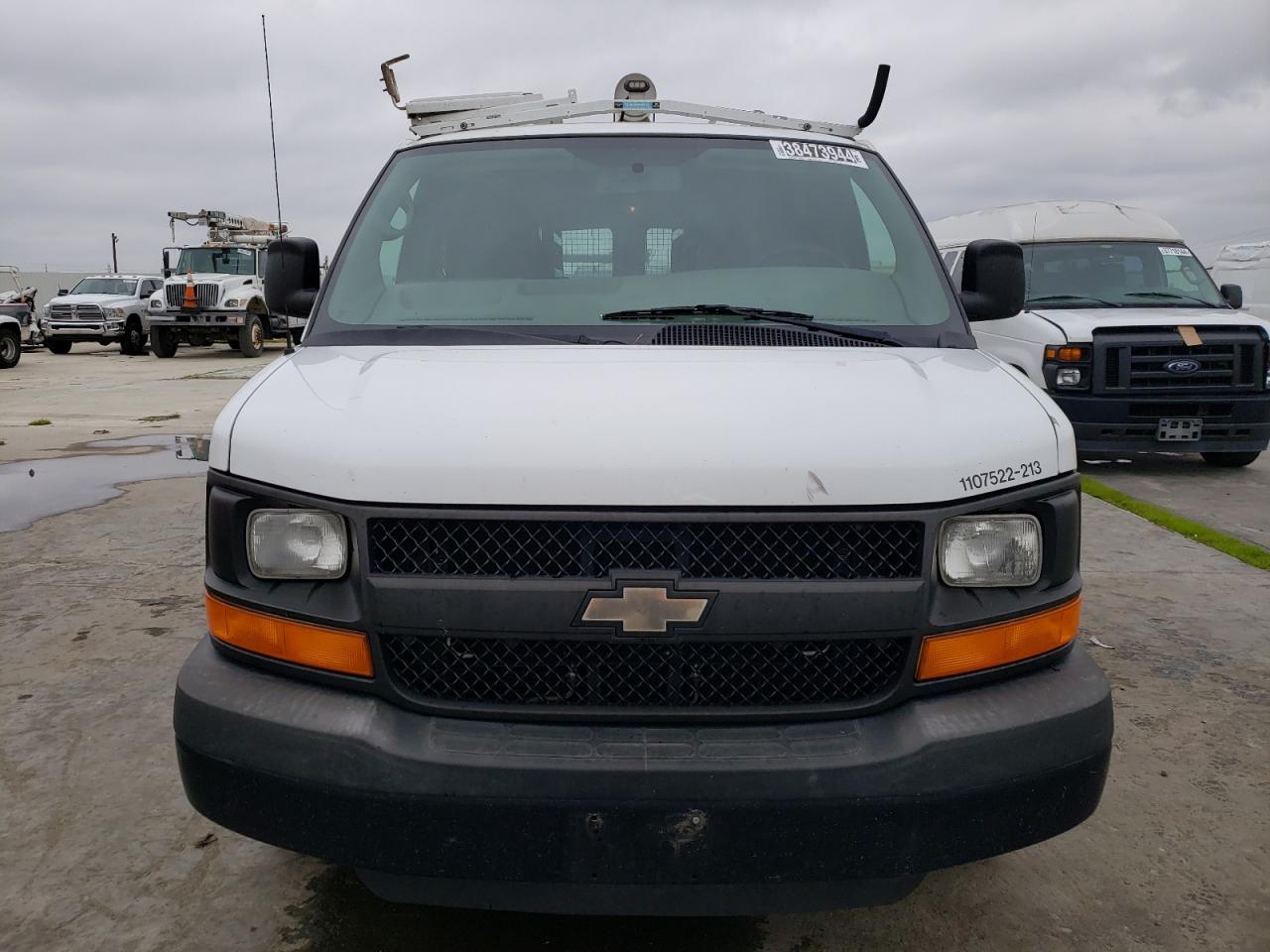 Photo 4 VIN: 1GCWGFCA8D1147485 - CHEVROLET EXPRESS 