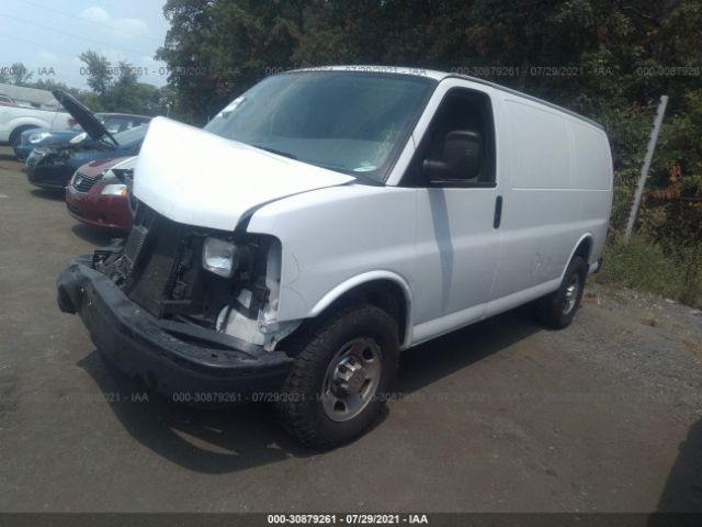 Photo 1 VIN: 1GCWGFCA9B1115383 - CHEVROLET EXPRESS CARGO VAN 