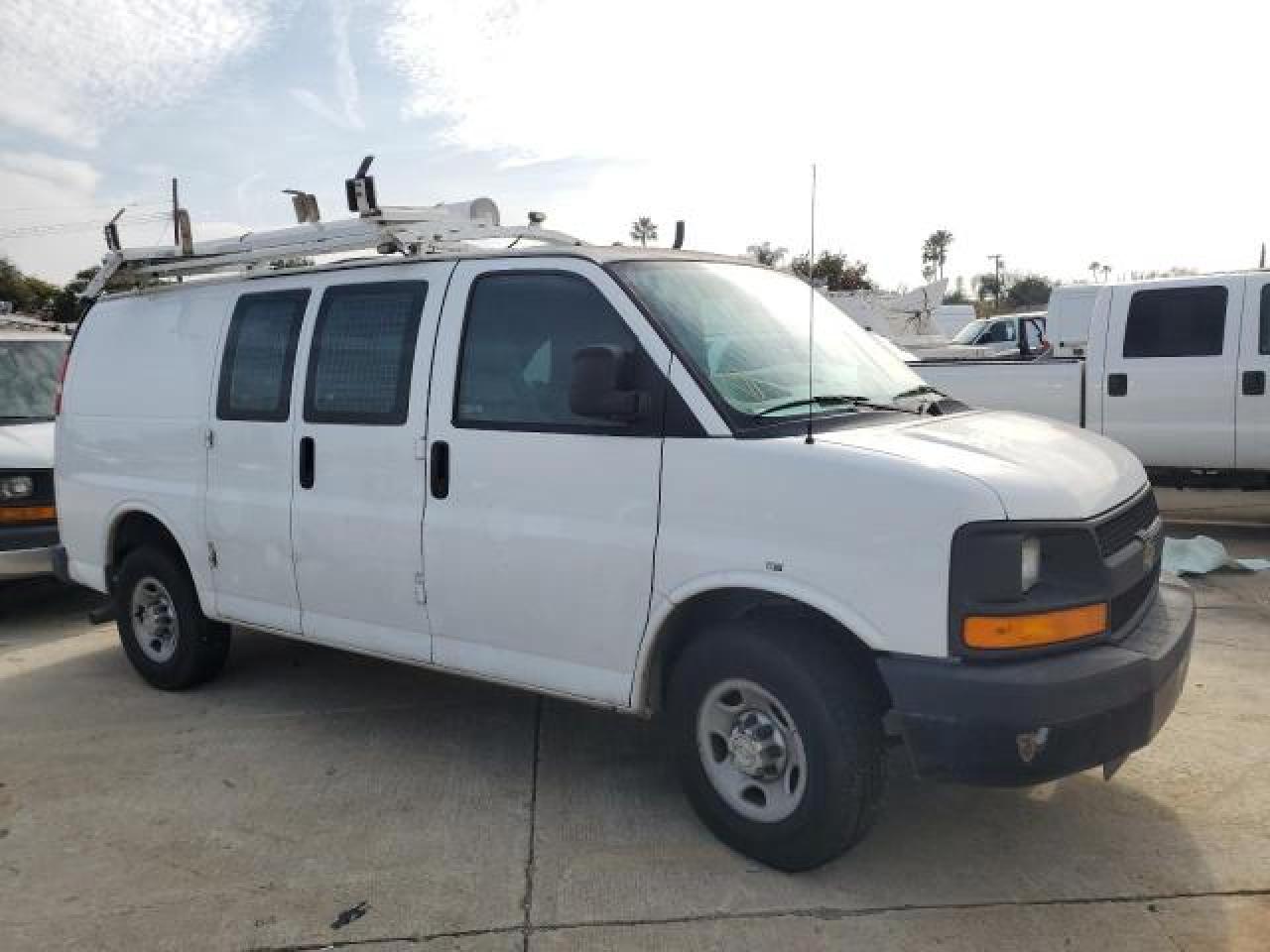 Photo 4 VIN: 1GCWGFCB2D1902316 - CHEVROLET EXPRESS 