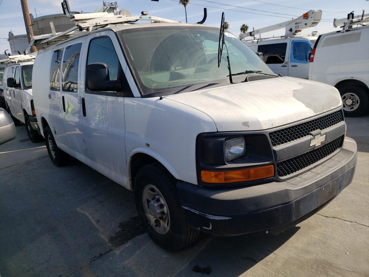 Photo 3 VIN: 1GCWGFCB4C1109694 - CHEVROLET EXPRESS 