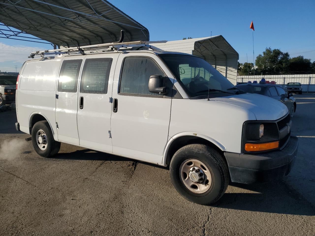 Photo 3 VIN: 1GCWGFCBXD1902211 - CHEVROLET EXPRESS 