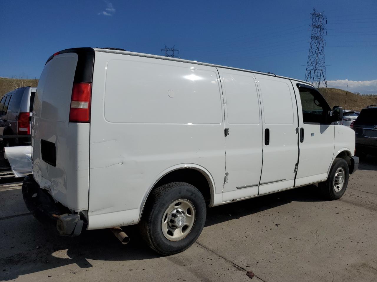 Photo 2 VIN: 1GCWGFCF3F1117423 - CHEVROLET EXPRESS 