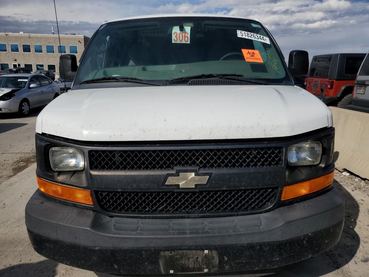 Photo 4 VIN: 1GCWGFCF3F1117423 - CHEVROLET EXPRESS 